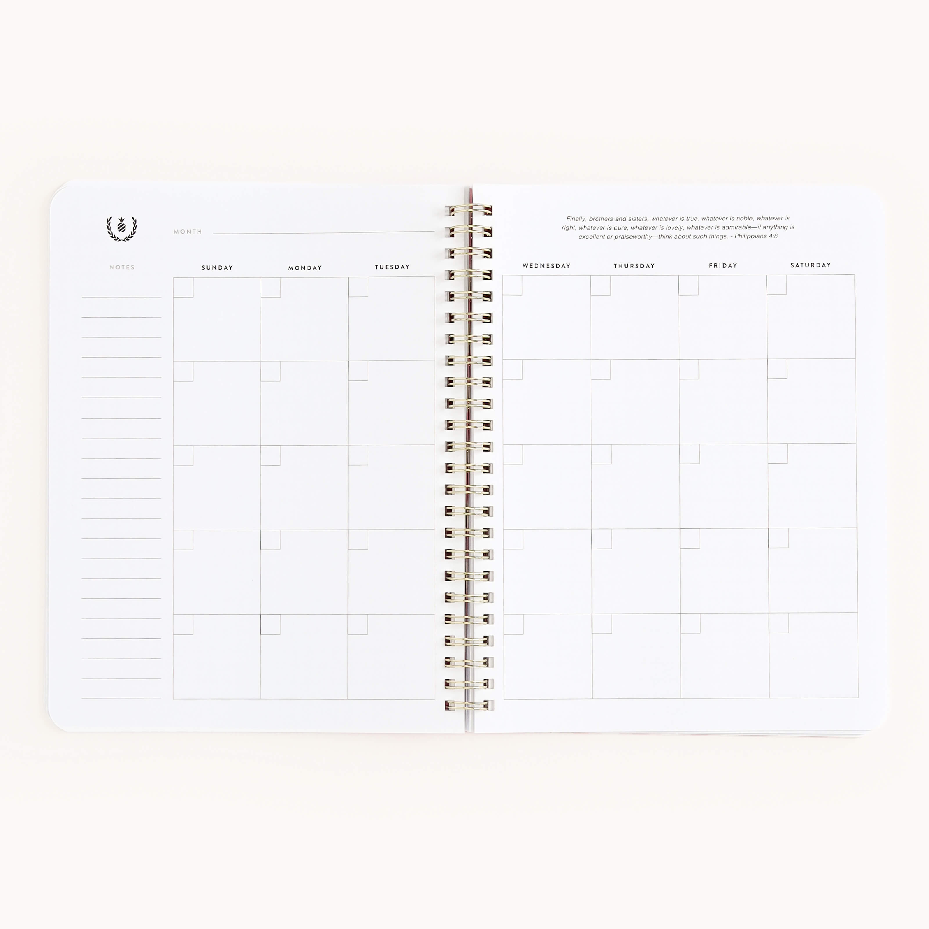 The Simplified Workbook - Faith features an open spiral-bound design with a blank monthly calendar, space for notes on the left page, and empty day squares—ideal for setting goals and creating actionable plans.
