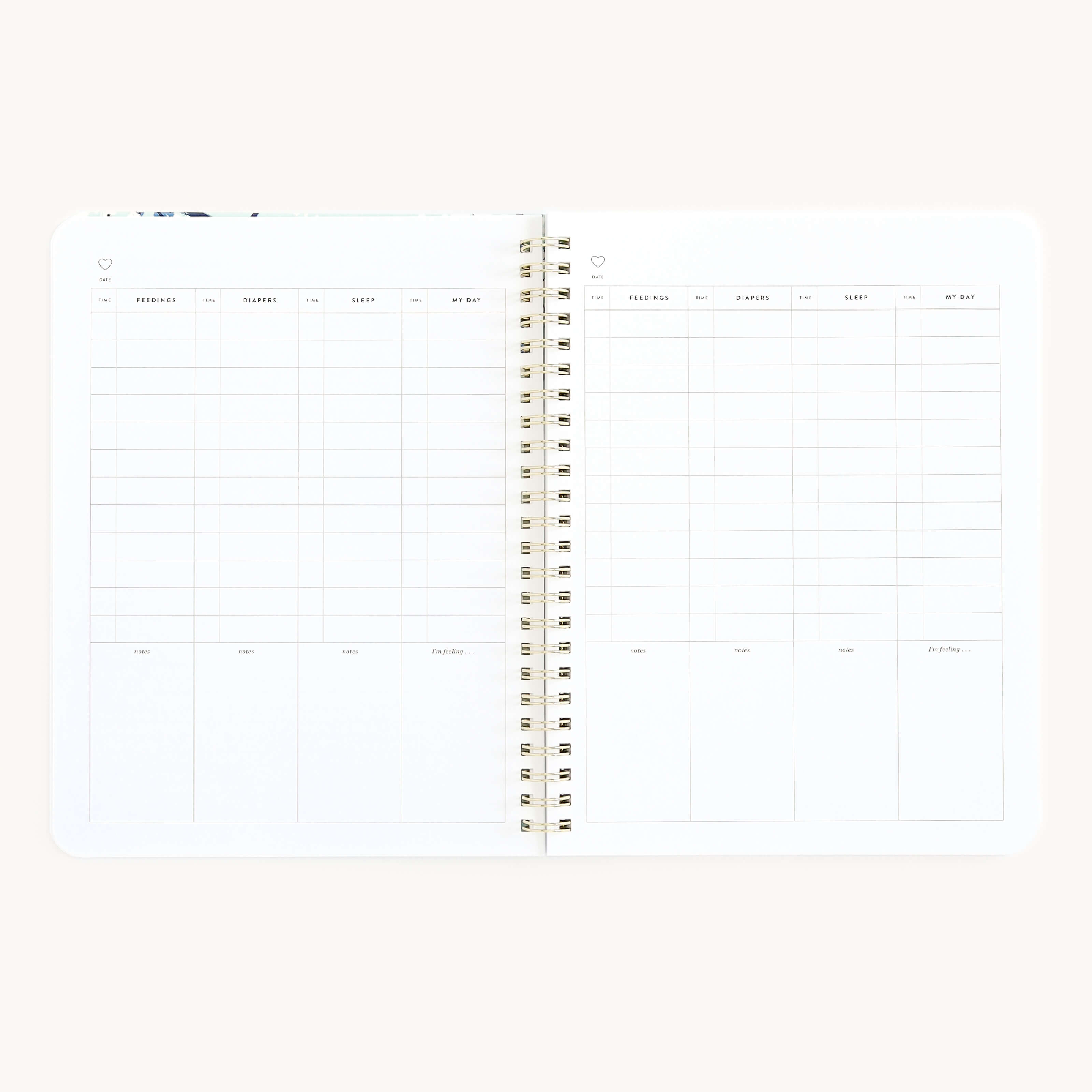 The Simplified Workbook - New Motherhood is an open spiral-bound planner revealing two pages of blank weekly schedules. Each page has columns for weekdays and rows for daily tasks, offering ample writing space in a minimalistic layout, ideal for busy parents to organize thoughts.