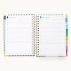 A 2025-2026 Spiral Daily Simplified Planner - Camp Gingham from Simplified displays a spread of Monday, August 7, and Tuesday, August 8, with lined sections for notes and colorful tabs adorned with elegant gold foil markers.