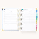 The 2025-2026 Spiral Daily Simplified Planner by Simplified, in Serene Stripe, displays its daily pages for Monday, August 7, and Tuesday, August 8, 2023. Each page has time slots, notes, and to-do lists. Colorful tabs and gold foil details enhance the organization experience.