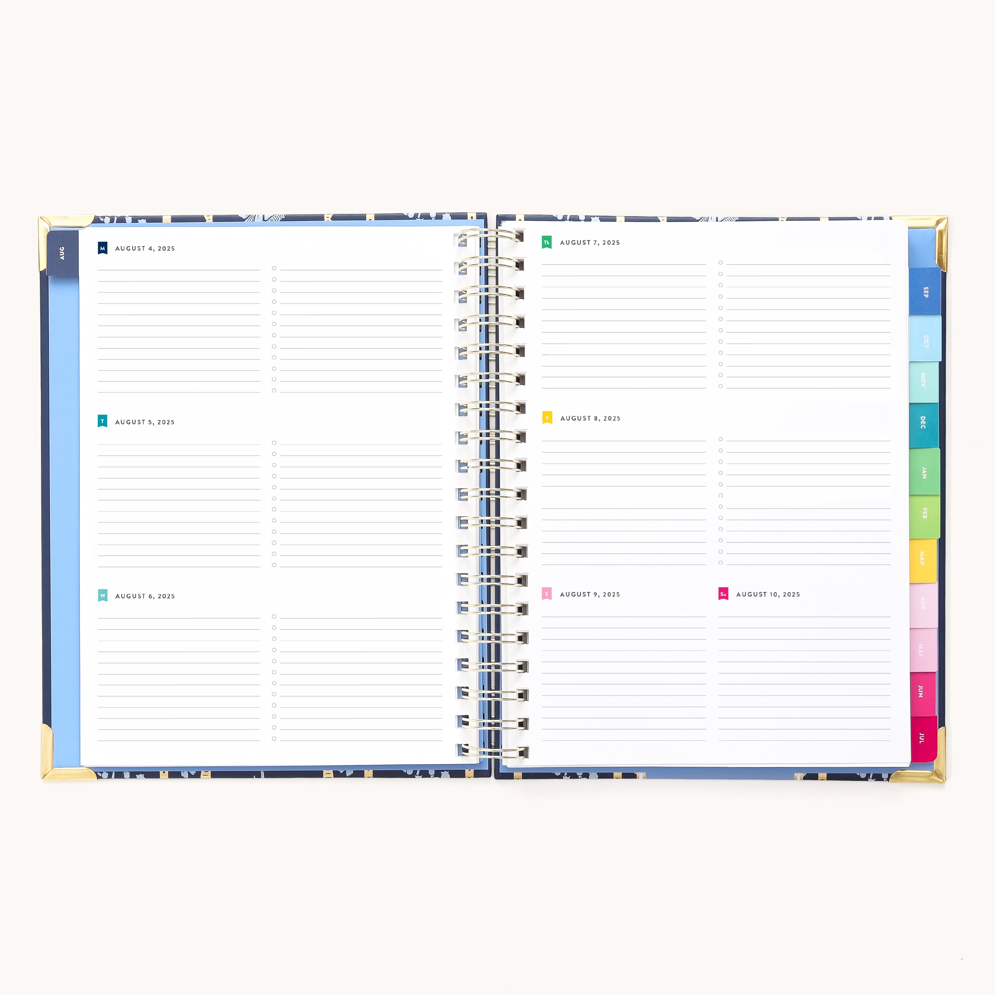 The 2025-2026 Spiral Weekly Simplified Planner by Simplified features a weekly layout with lined sections for daily notes and colorful tab dividers. Its elegant dark floral cover with gold corners enhances its style.