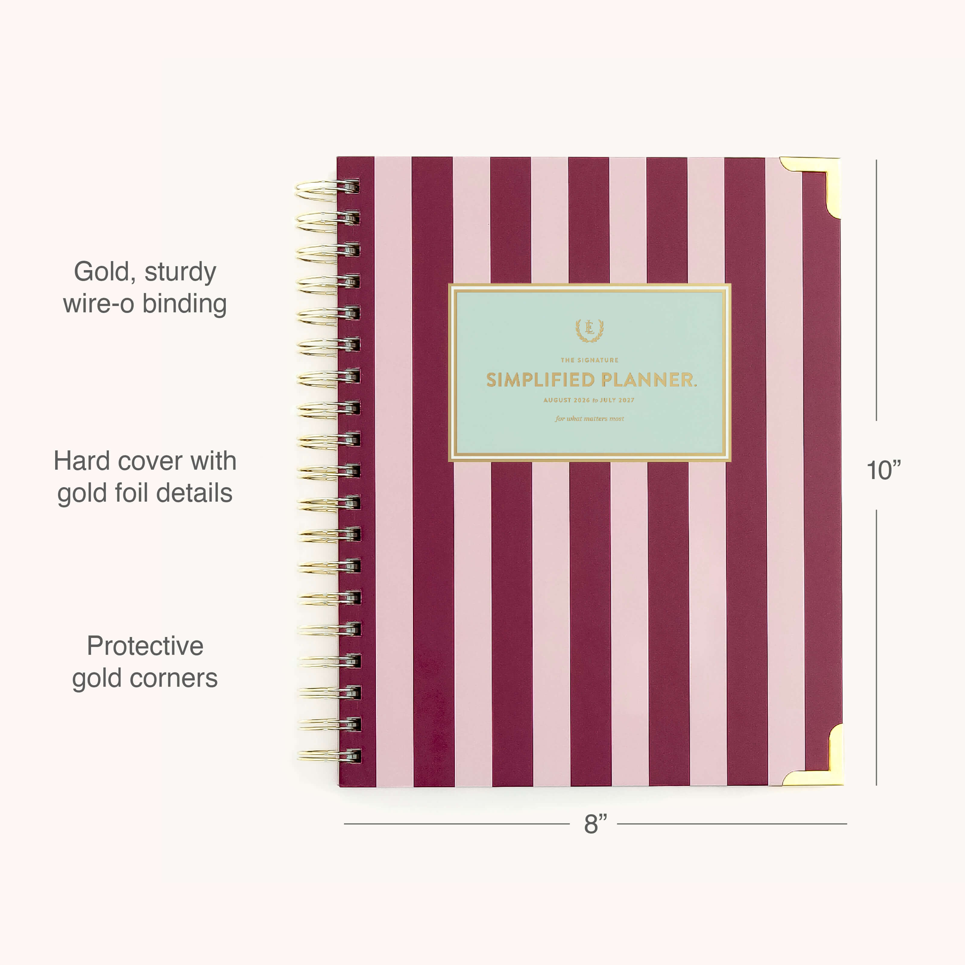 The 2026-2027 Spiral Weekly Simplified Planner - Berry Stripe by Simplified features a berry and pink stripe design, gold foil accents, sturdy gold wire-o binding, protective gold corners, and measures 10” x 8”.