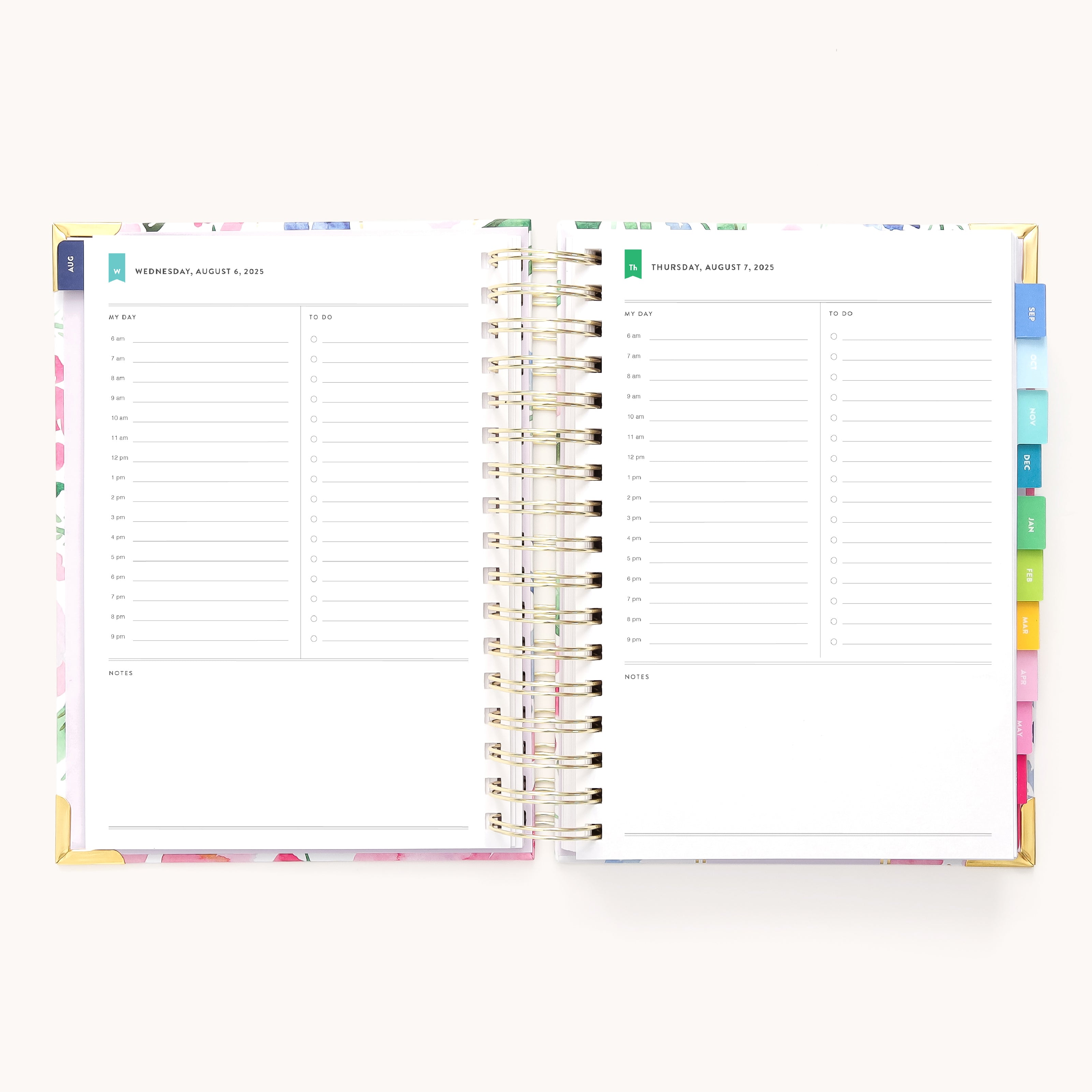 The 2025-2026 Spiral Daily Simplified Planner in Cottage Floral by Simplified is open to August 16-17, 2023, showcasing a weekly layout. Its designed with lined sections for hourly schedules and notes, has colorful tabs, and features elegant gold spiral binding with subtle gold foil details.