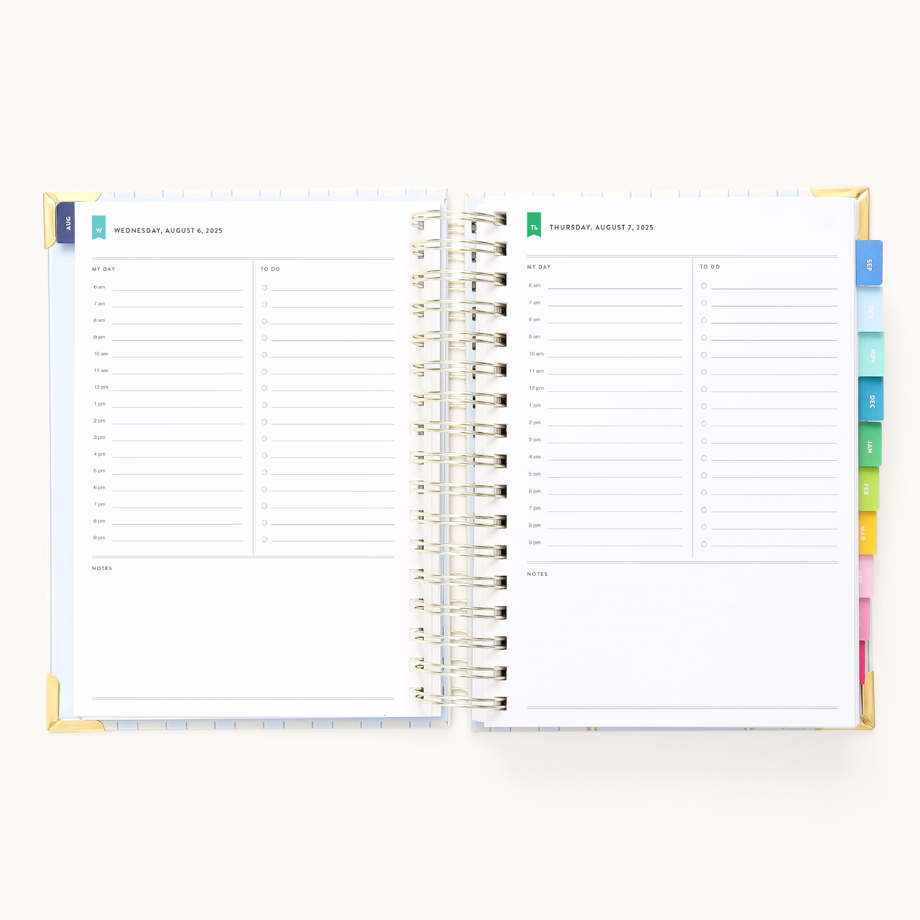 The 2025-2026 Spiral Daily Simplified Planner - Serene Stripe by Simplified has a spiral-bound design with gold foil, showcasing a weekly layout for August 2-3, 2023. Each page includes sections for schedules, to-do lists, and notes. Colorful tabs on the right edge ensure easy navigation.