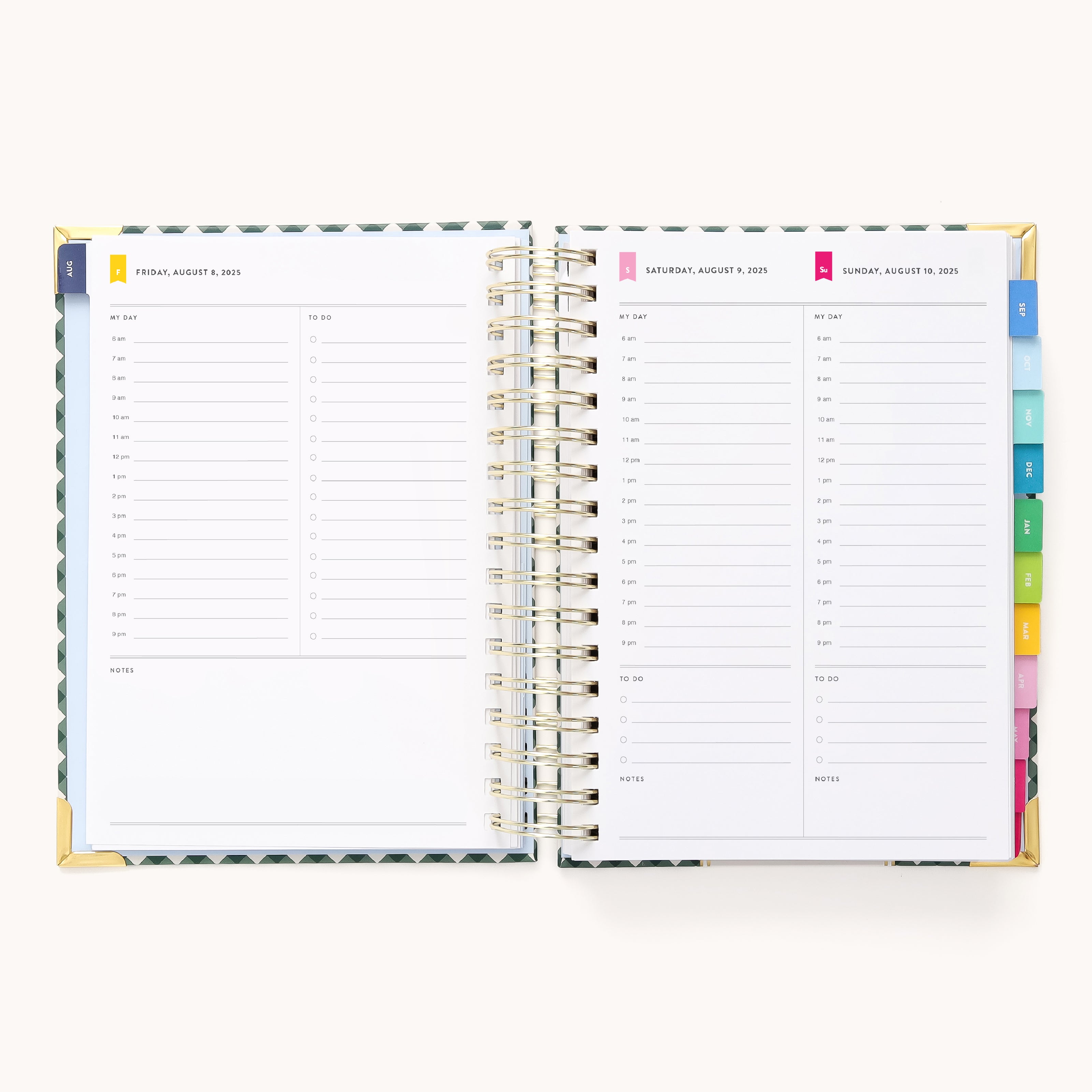 The 2025-2026 Spiral Daily Simplified Planner - Camp Gingham by Simplified features a gold foil detailed open spiral-bound design with color-coded tabs. Time slots from 7 AM to 7 PM and notes sections outline Fridays agenda on the left page and Saturday/Sunday on the right.