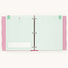 The Simplified Big Kid Book - Raspberry is an open pastel scrapbook with two pages: the left displays a party hat illustration, text for personal information, and the right offers a so good sticker and lined writing space, all bordered in pink with white polka dots.