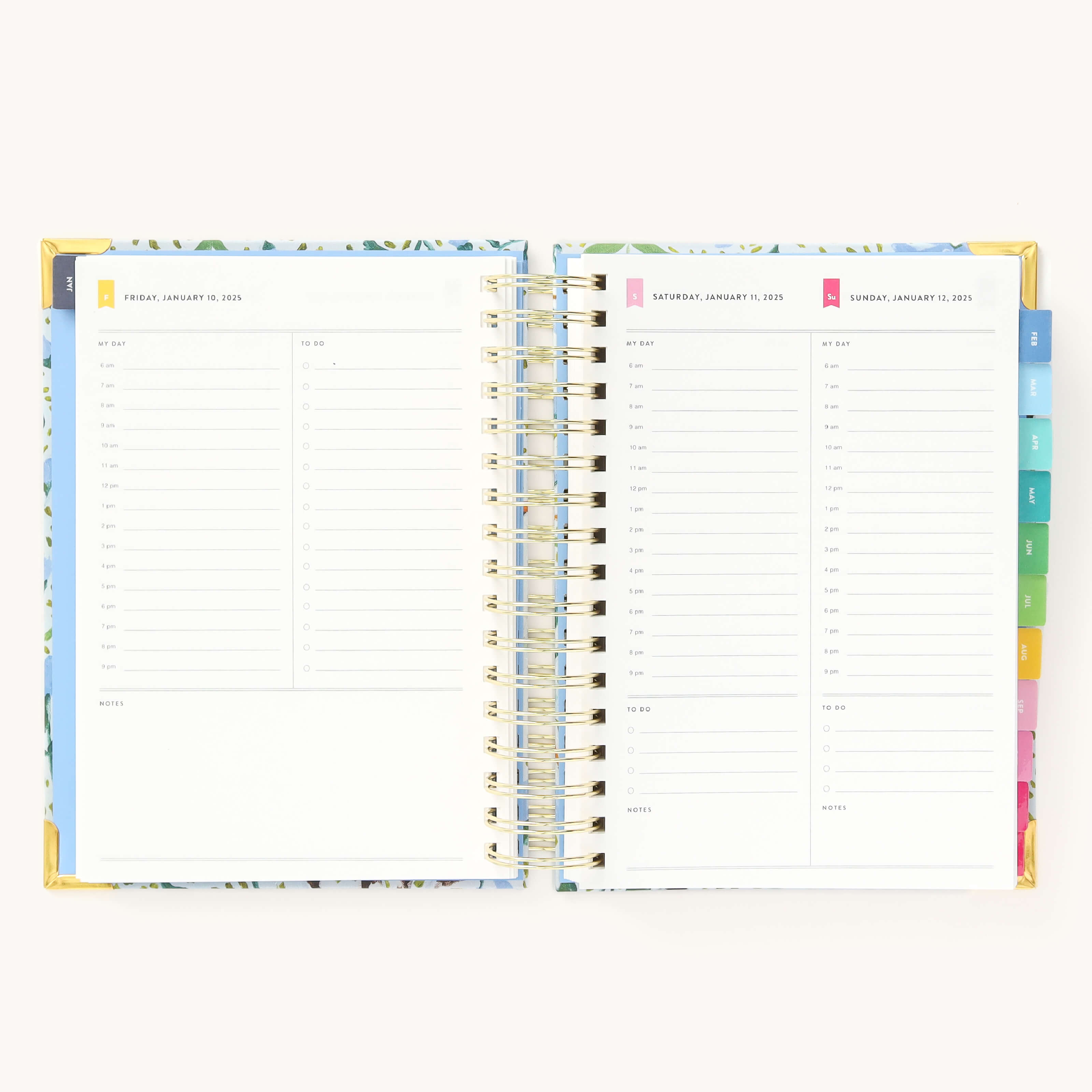 2025 Daily Simplified Planner by Emily Ley in the Beaufort Birdies cover design open to a two-page weekend spread. Features a clean, minimalistic design with lined sections for daily tasks, to-do lists, and notes. Includes color-coded weekday labels, durable spiral binding, and gold corner protectors.