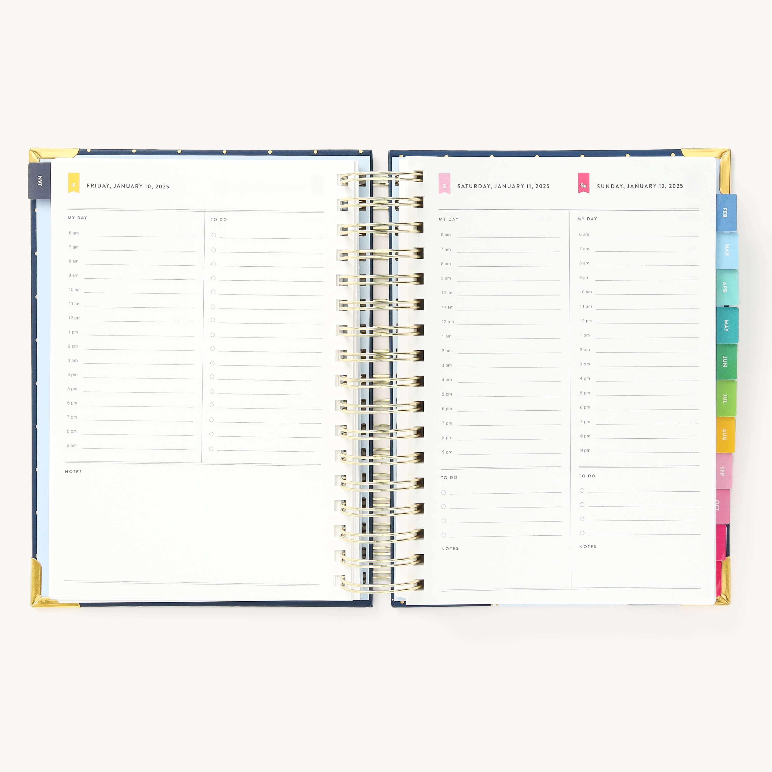 2025 Daily Simplified Planner by Emily Ley in the Dainty Dot cover design open to a two-page weekend spread. Features a clean, minimalistic design with lined sections for daily tasks, to-do lists, and notes. Includes color-coded weekday labels, durable spiral binding, and gold corner protectors.