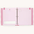 Open the Simplified Big Kid Book - Raspberry scrapbook with pink cover and polka dot accents. The left page, Six Years Old, invites stories of a childs adventures, while the right page showcases A Letter to You with lined sections and colorful decorations.