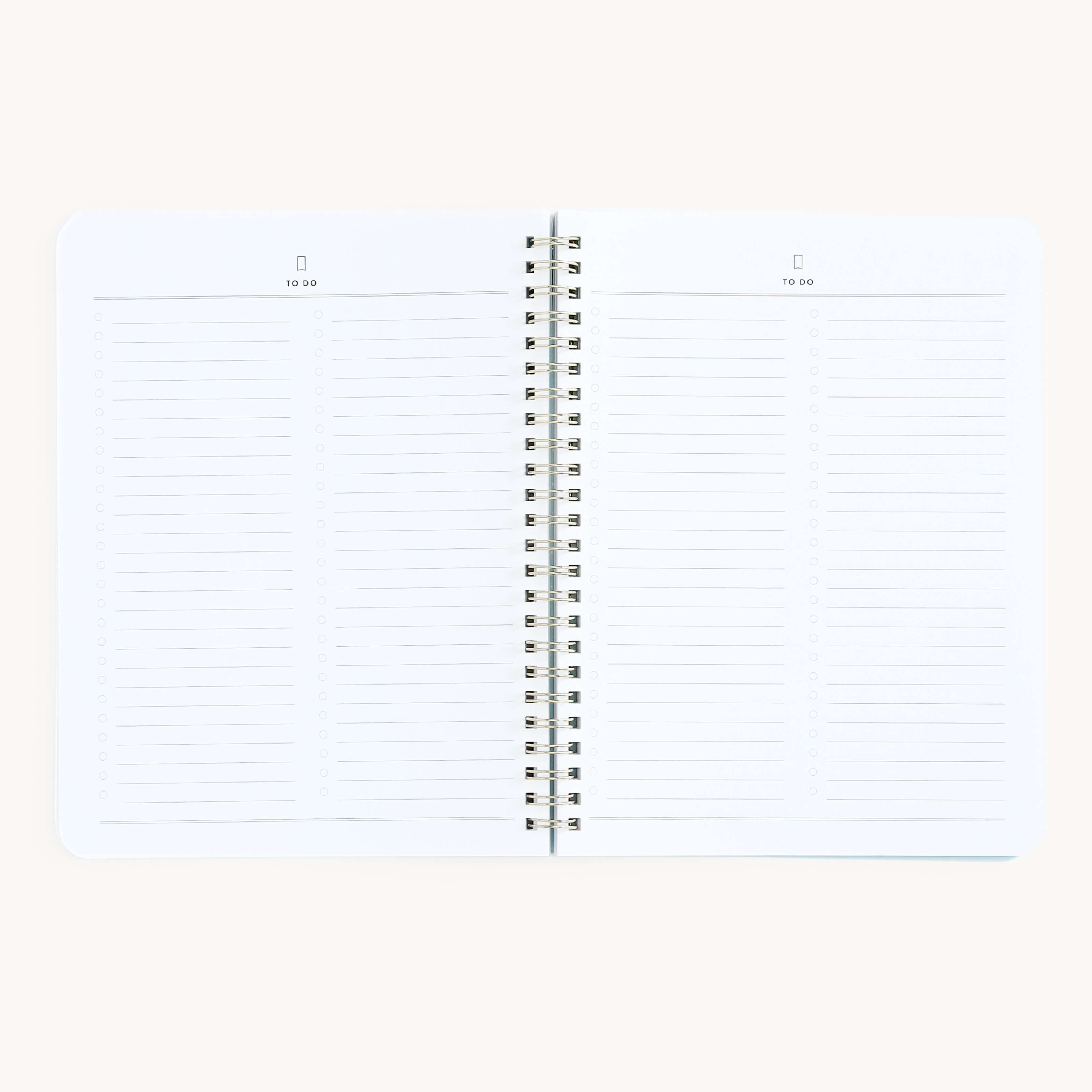 Simplifieds Workbook - Entrepreneurship is a spiral-bound notebook featuring TO DO sections on each lined page, ideal for scribbling business ideas, with a plain, light-colored cover.