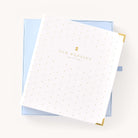 Simplified Wedding Planner displayed alongside its Carolina blue keepsake box with gold foil accents