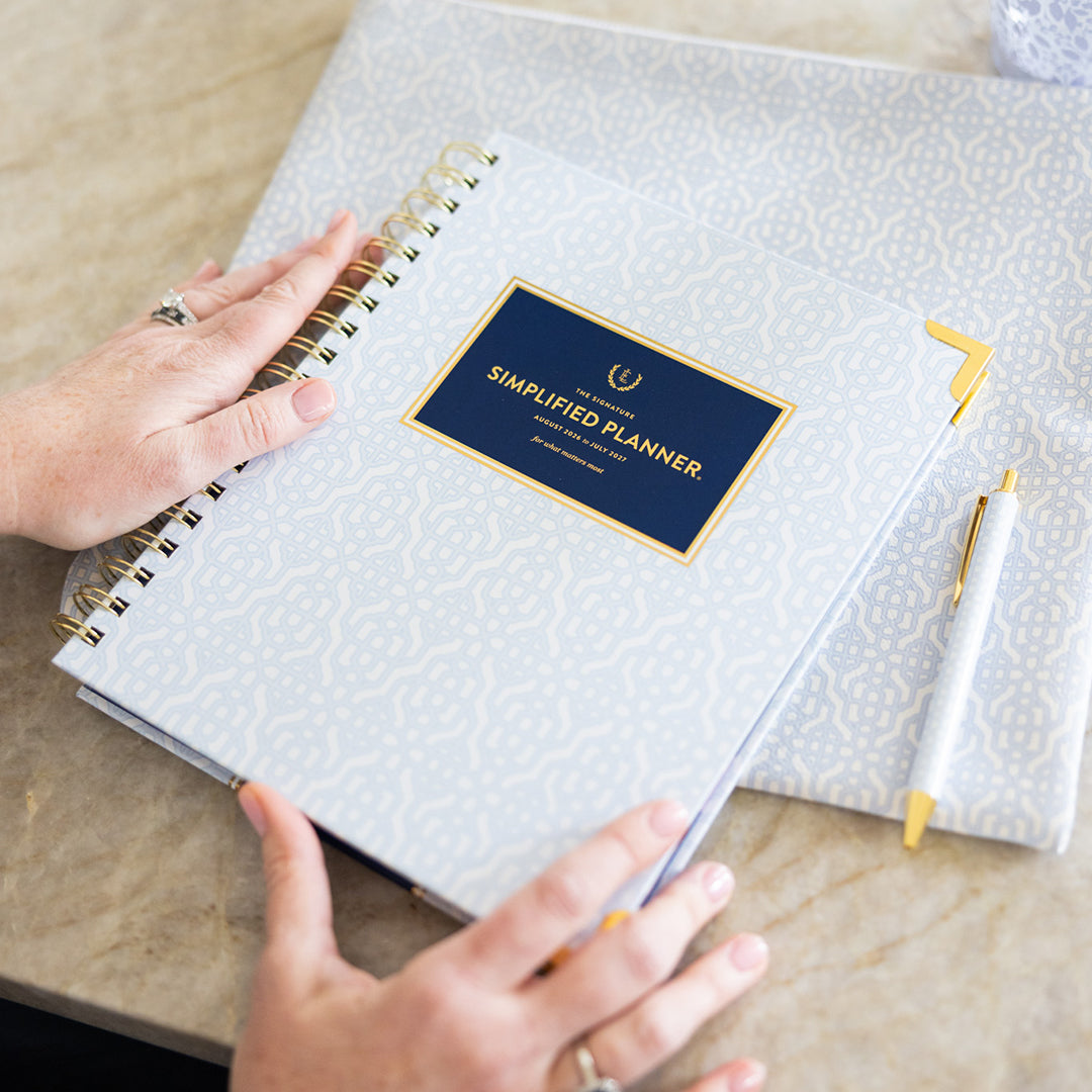 Carolina Trellis spiral weekly planner styled on desk with elegant accessories for cheerful, organized planning