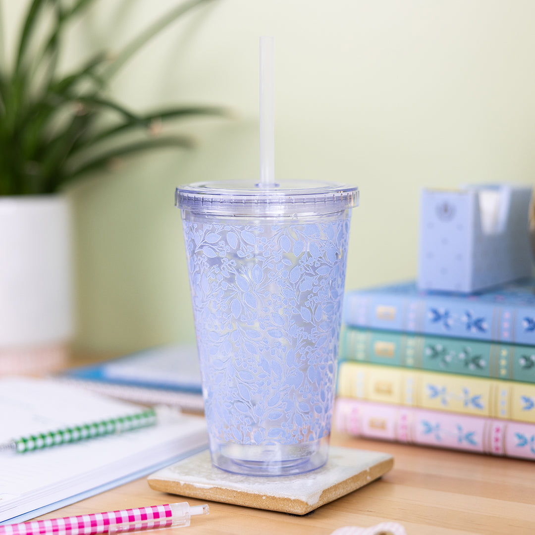 Misty Meadow clear tumbler and straw on desk