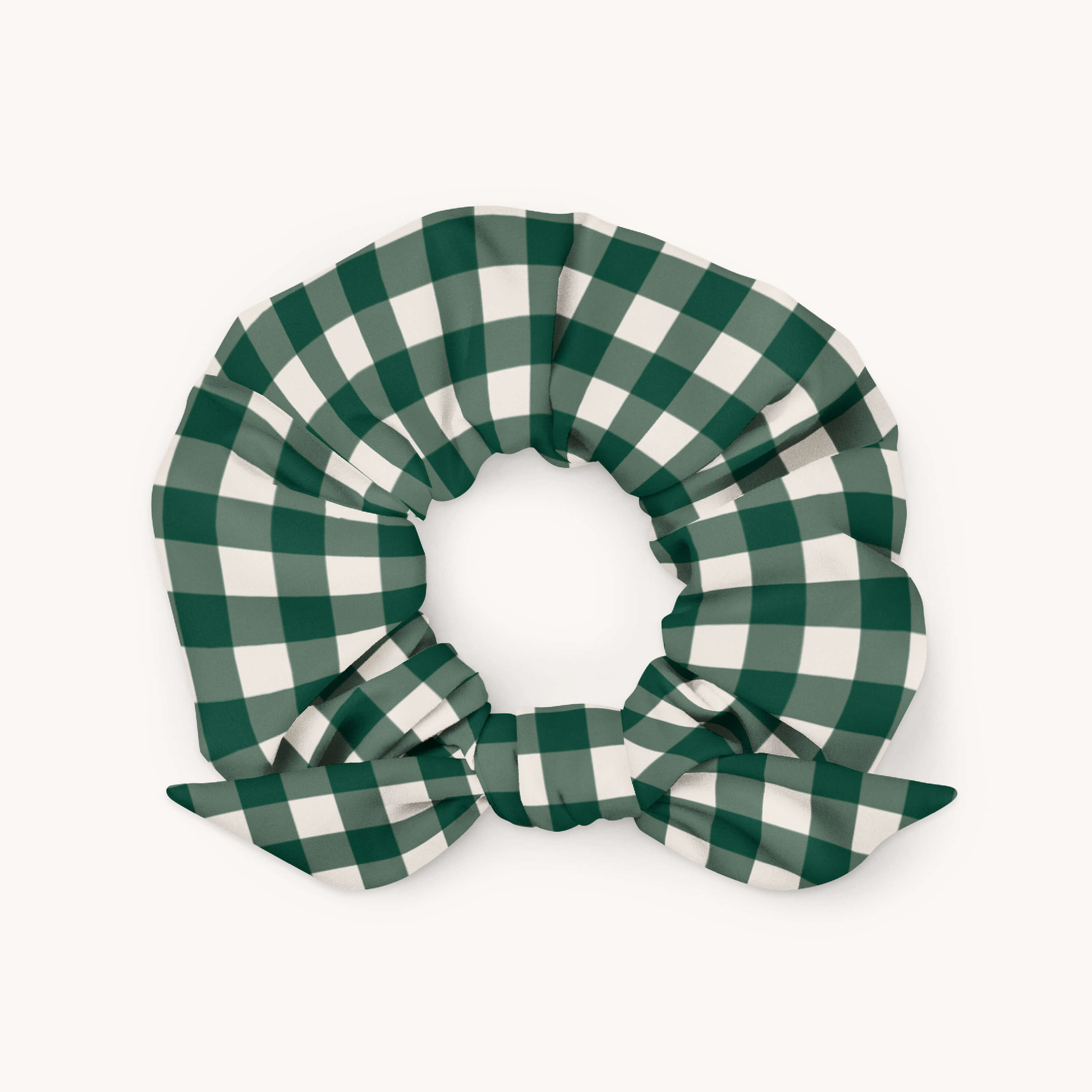 The Simplified Scrunchie - Camp Gingham features a green and white checkered microfiber fabric with a bow, shown on a plain white background.