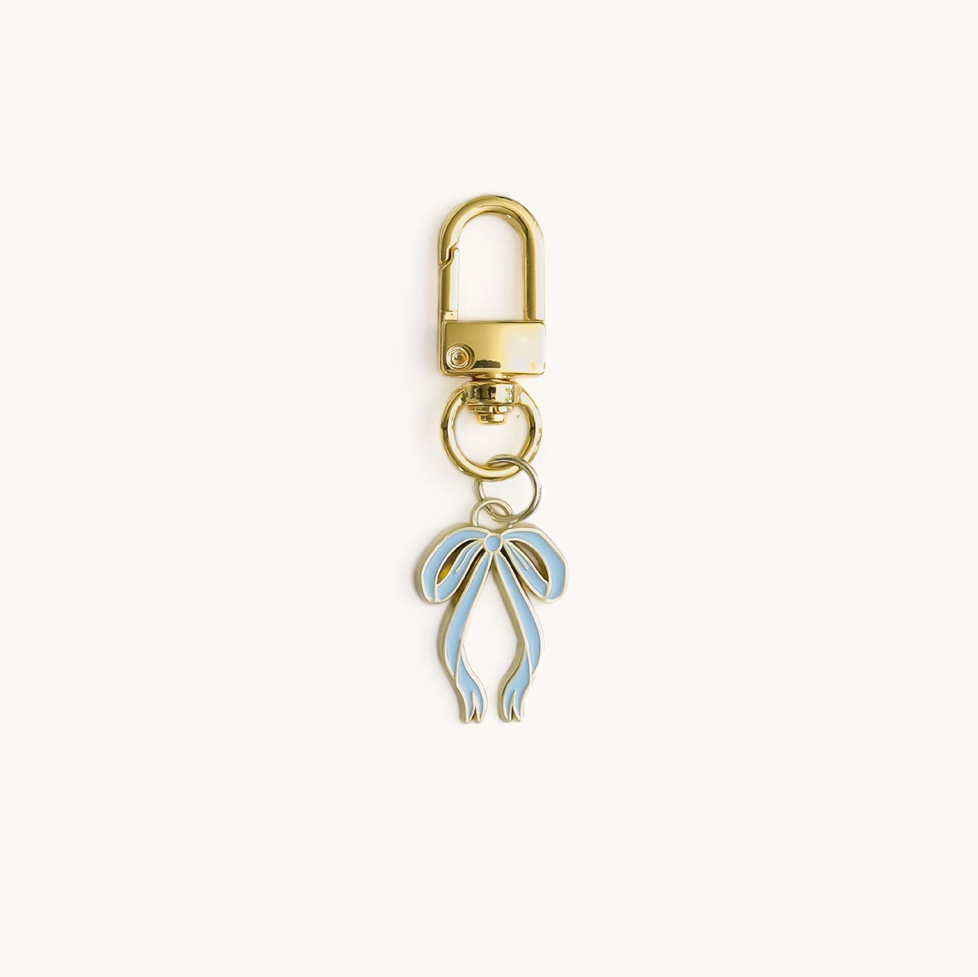 Bow enamel charm with gold clasp key ring by Simplified by Emily Ley