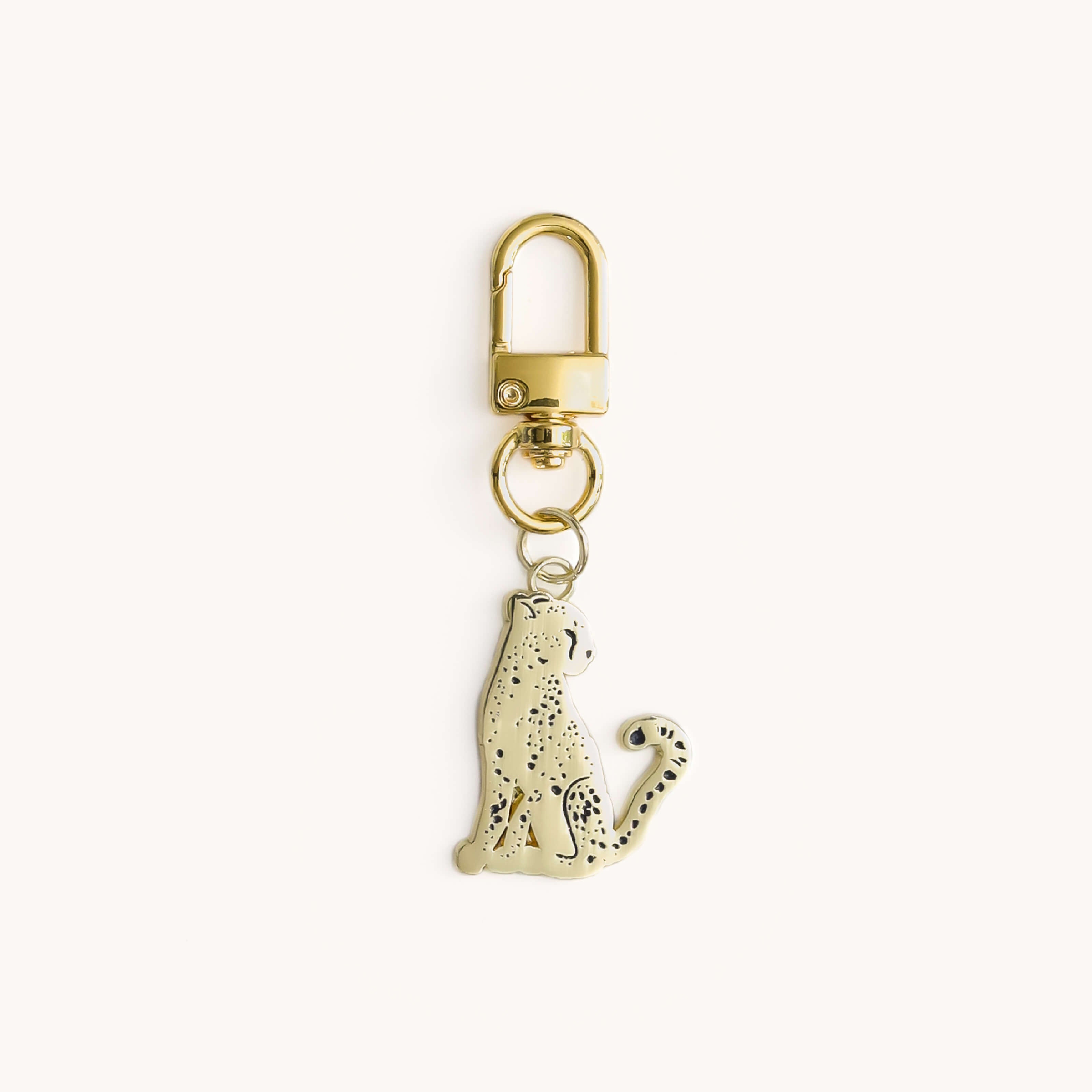 Cheetah enamel charm with gold clasp key ring by Simplified by Emily Ley
