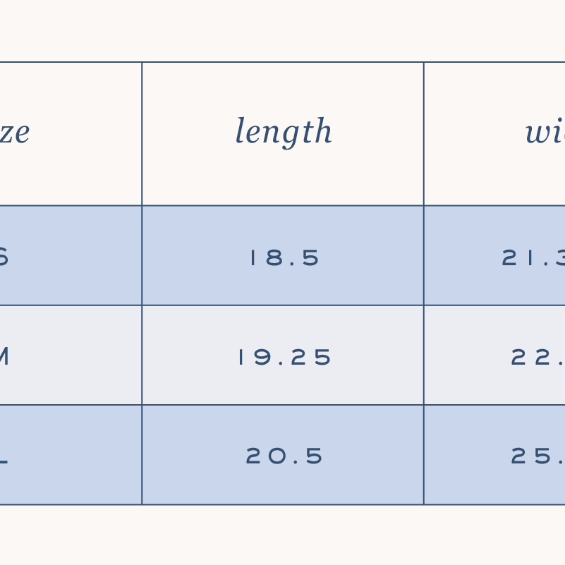 A blue and white size chart for the Simplified Embroidered Crop Sweatshirt - Red Bow shows size, length, and width in three columns with a laurel icon—making it easy to find your perfect fit for this cozy embroidered sweatshirt.