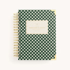 The Simplified 2026 Spiral Daily Simplified Planner - Camp Gingham features a green and white gingham cover, spiral binding, gold corner protectors, and a centered label with the planner name in gold.