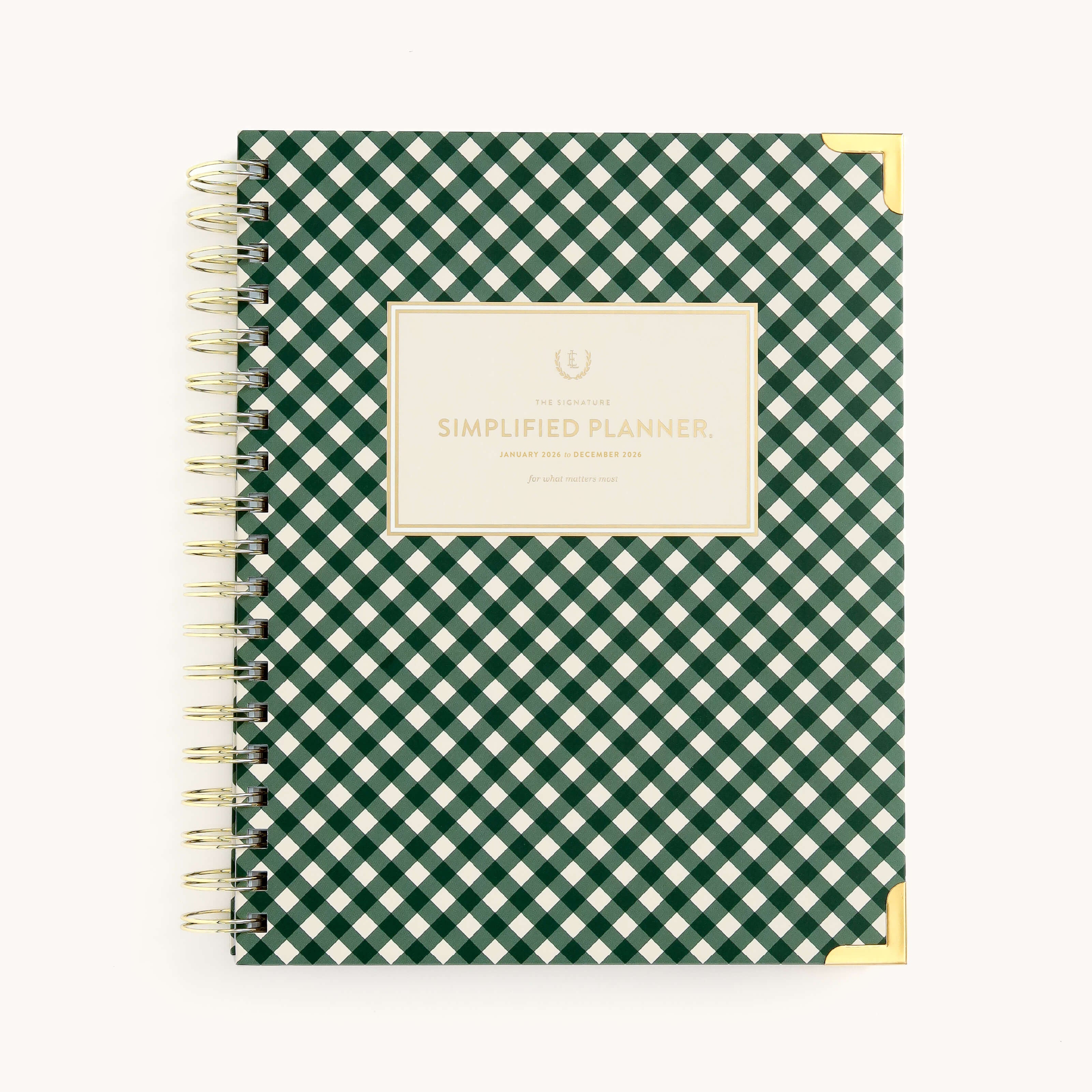 The Simplified 2026 Spiral Weekly Simplified Planner - Camp Gingham features a spiral binding, green and white gingham cover, gold corner accents, and a centered label.