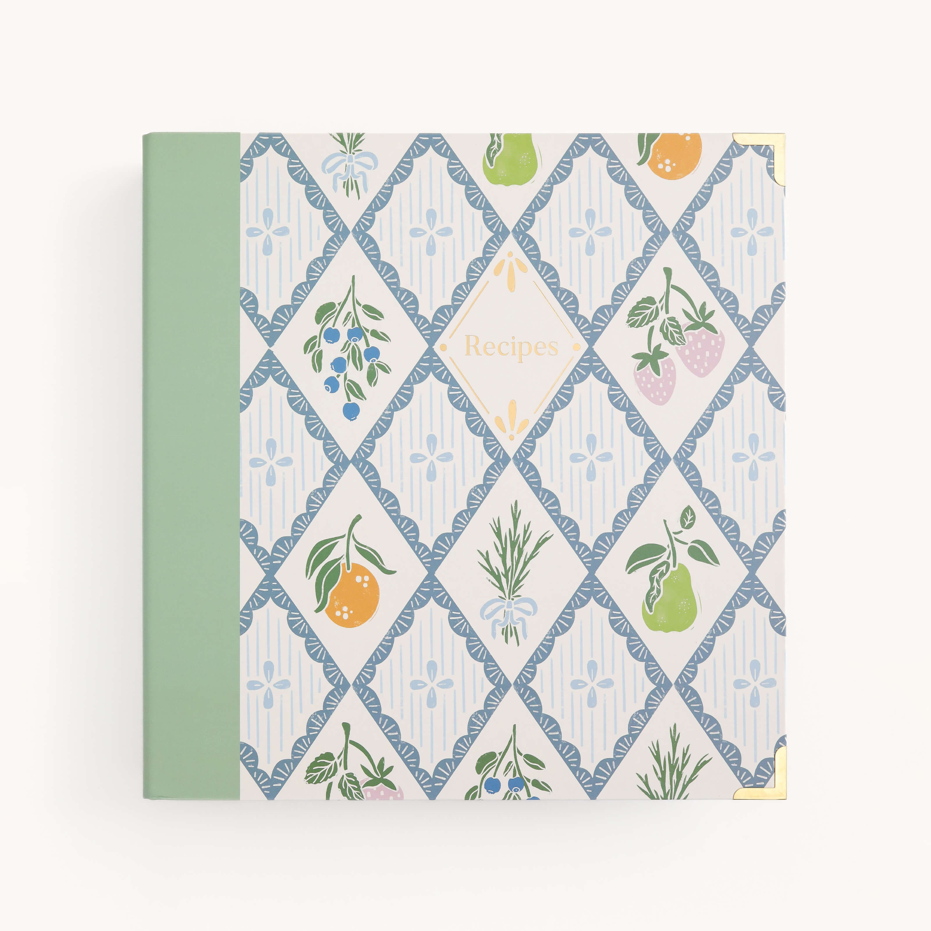 The Simplified WS - Recipe Binder features a green spine and a cover with diamond patterns decorated with fruits, vegetables, and herbs. "Recipes" is printed in the central diamond.