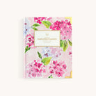 Blush Hydrangea bookbound weekly planner with floral cover and elegant bound design for organized weekly planning