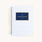 Carolina Trellis spiral daily planner with a structured geometric cover, gold corners, and durable wire binding for everyday planning