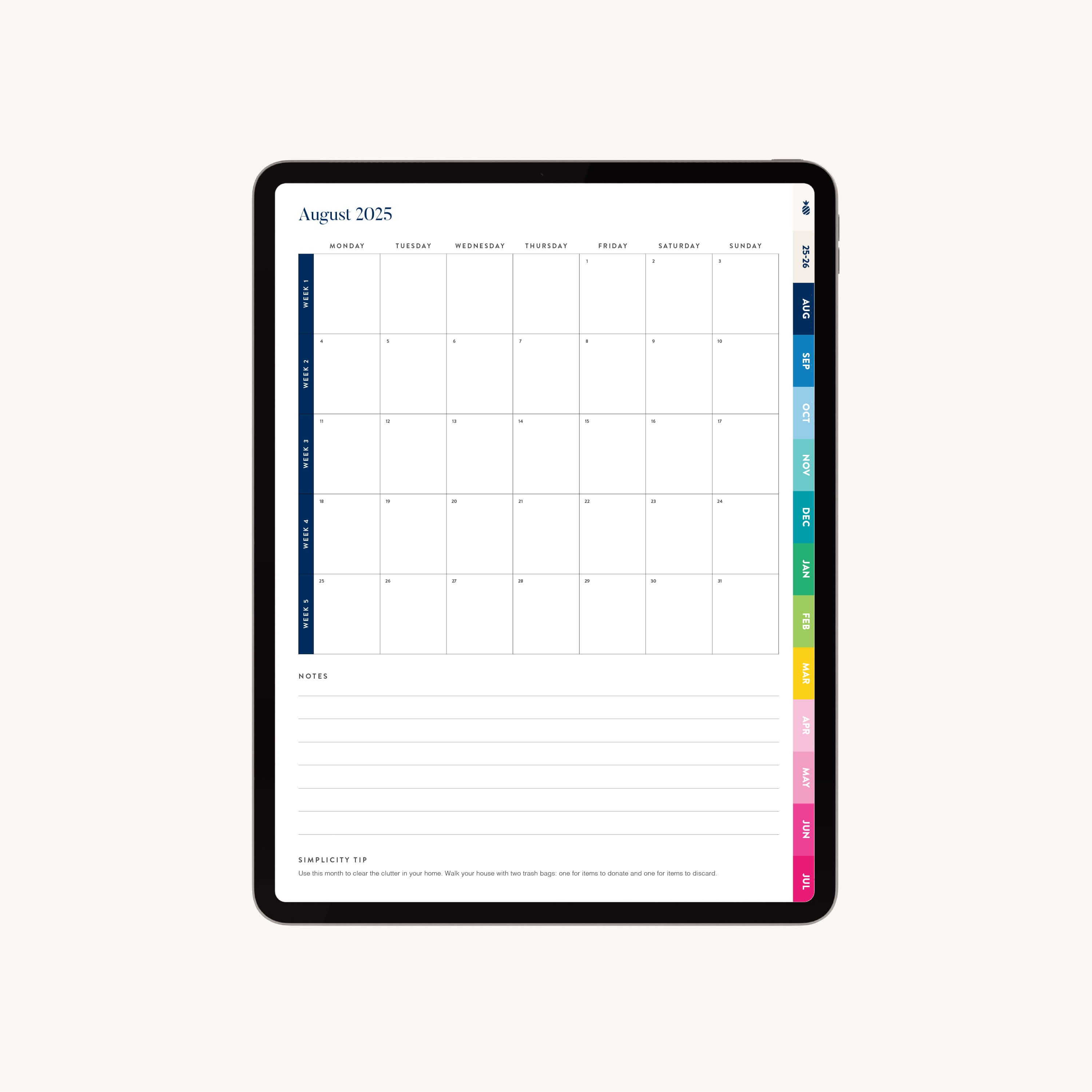 An iPad shows the Simplified 2025-2026 Digital Simplified Planner by Emily Ley, featuring an August 2025 blank calendar, lined notes, a simplify tip at the bottom, and colorful monthly tabs on the right.
