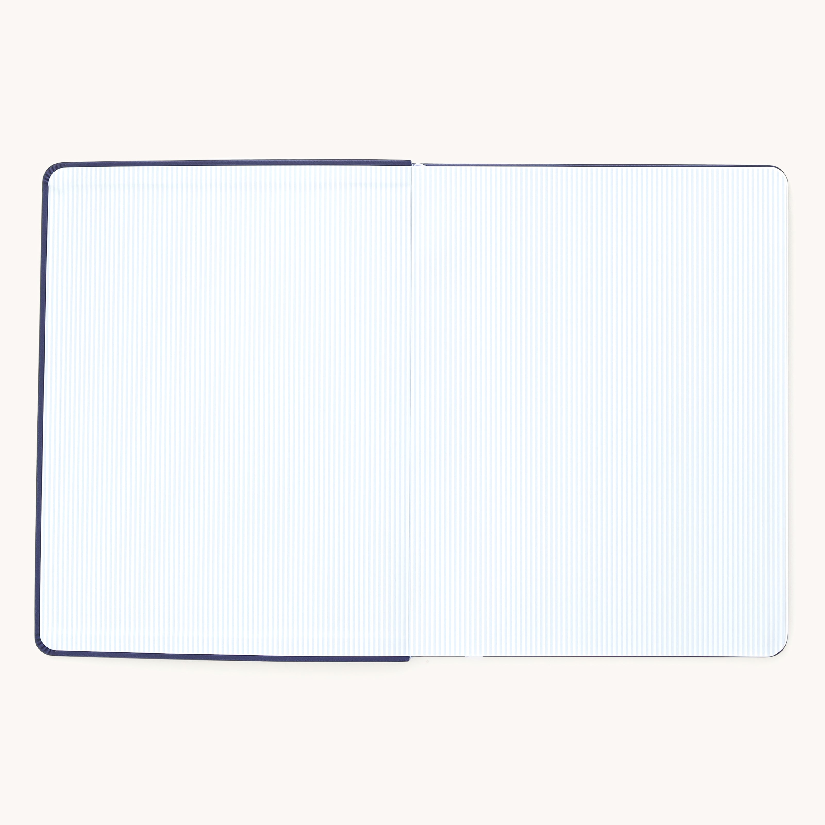 Leatherette Dapperdesk weekly planner interior with blue pinstripe liner and clean bookbound design for a polished, professional planning experience