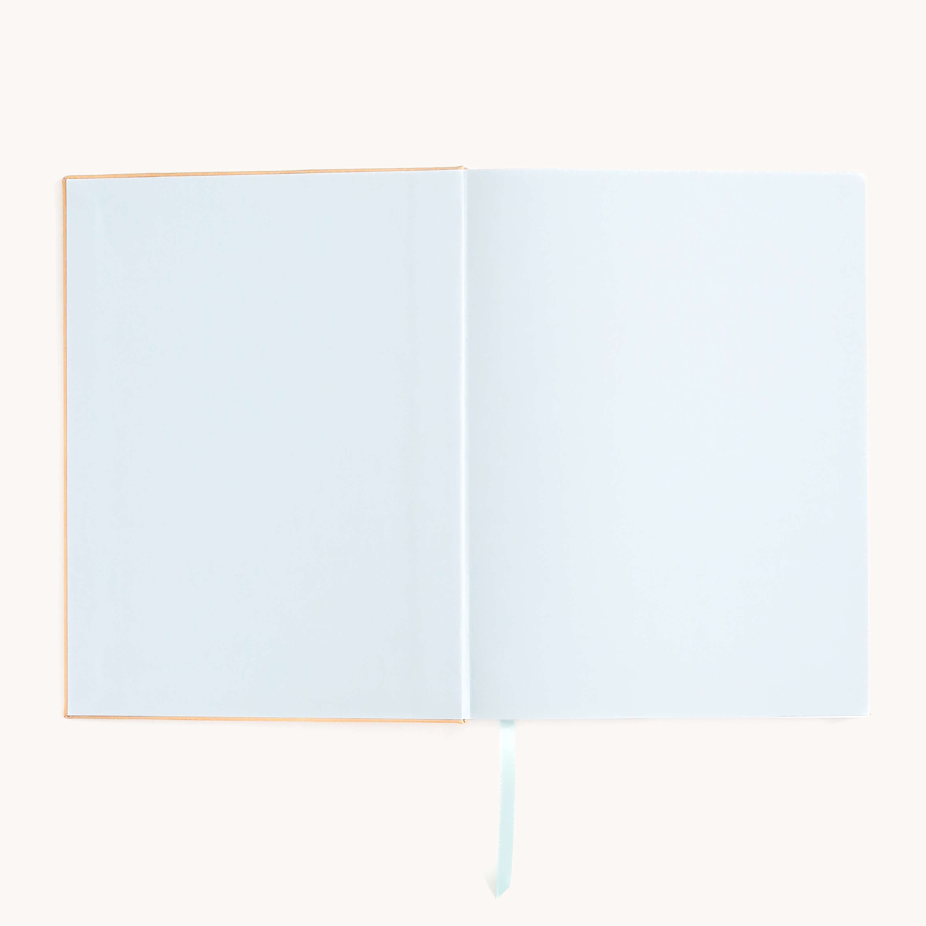 Cheetah Linen Journal interior with soft blue endpapers and ribbon marker for an elegant, calming writing experience