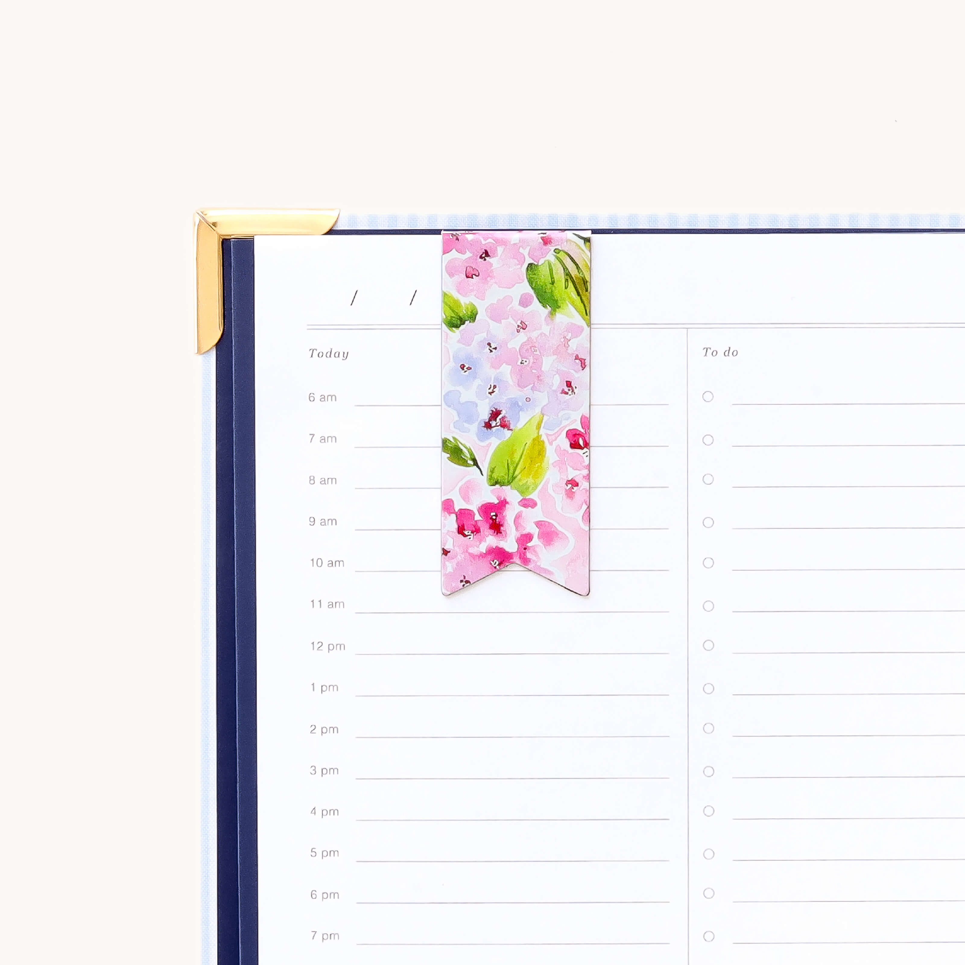 Magnetic page marker clipped onto planner page with Blush Hydrangea design for easily marking your place and organizing daily plans
