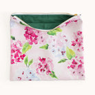 Blush Hydrangea pouch unzipped to reveal spacious interior with soft green lining for storing planners, pens, and accessories