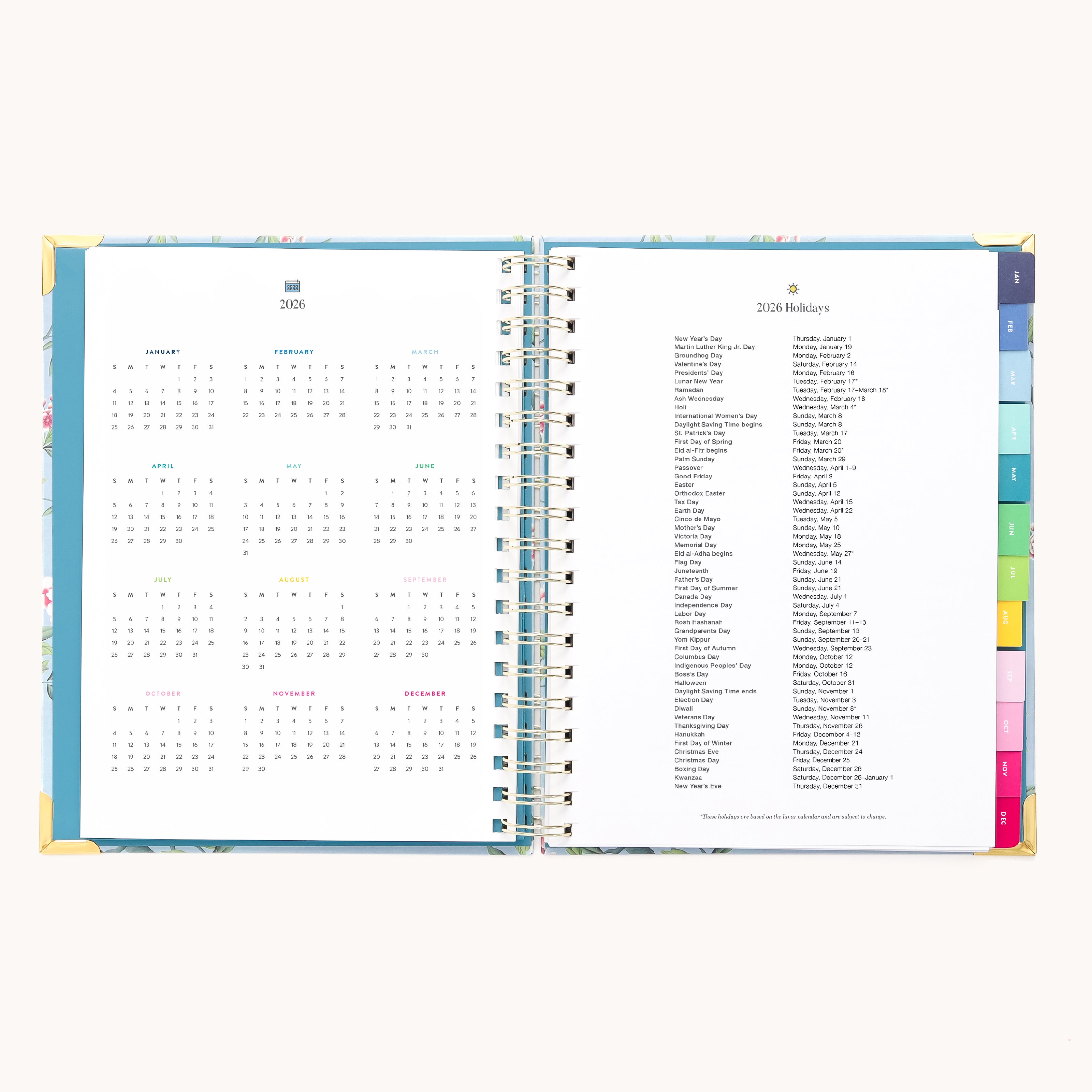 The 2026 Spiral Weekly Simplified Planner - Faraway Land by Simplified features a weekly layout with a yearly calendar and holiday list, plus colored tab dividers along the edge for easy organization.