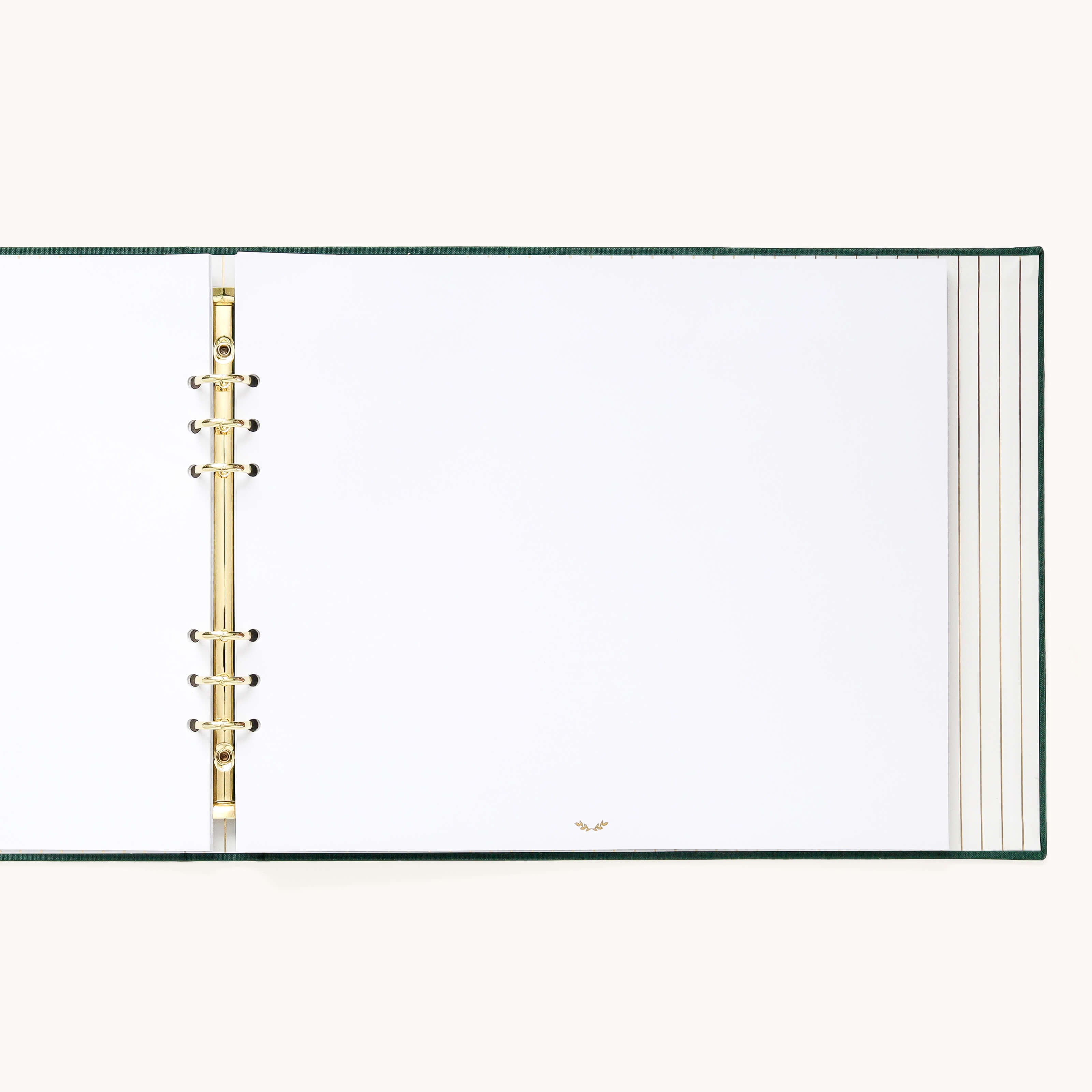 Evergreen Holiday Memories Book open to a blank white page on gold o-rings, ready for photos and holiday cards