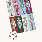 Nutcrackers 500-Piece Jigsaw Puzzle completed, with a handful of loose pieces scattered near one corner