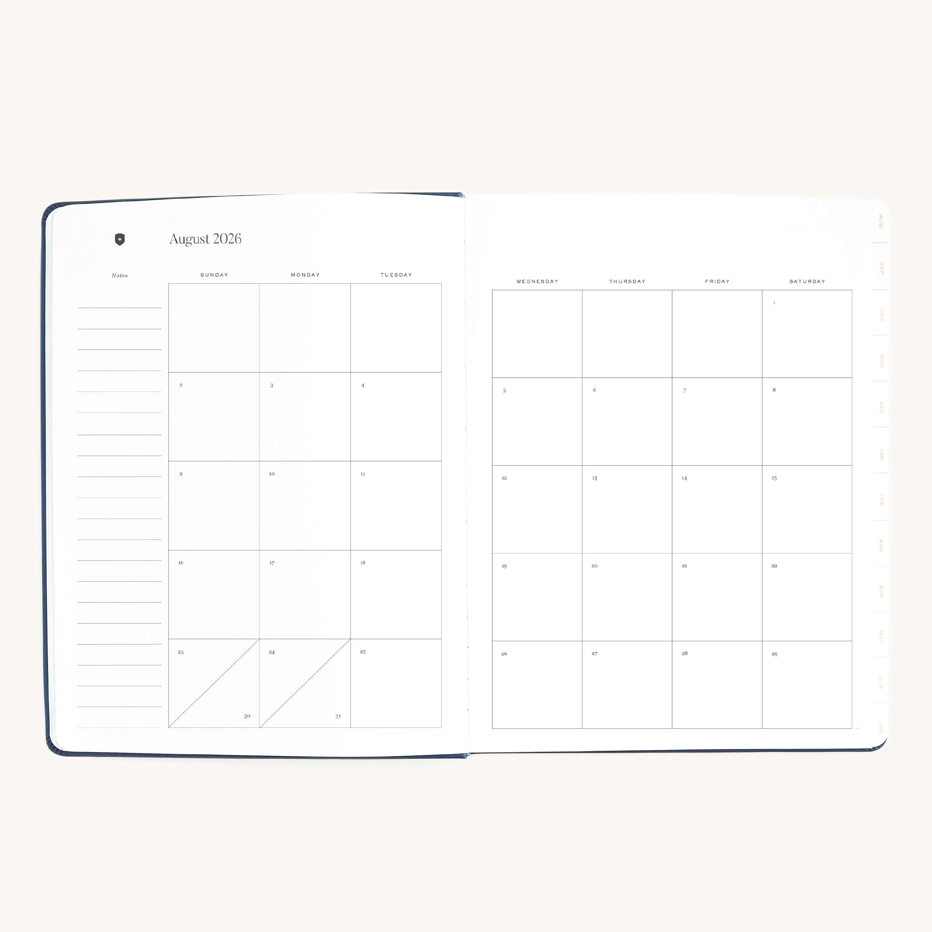 August monthly spread in dapperdesk weekly planner with simple calendar grid for scheduling and goal setting
