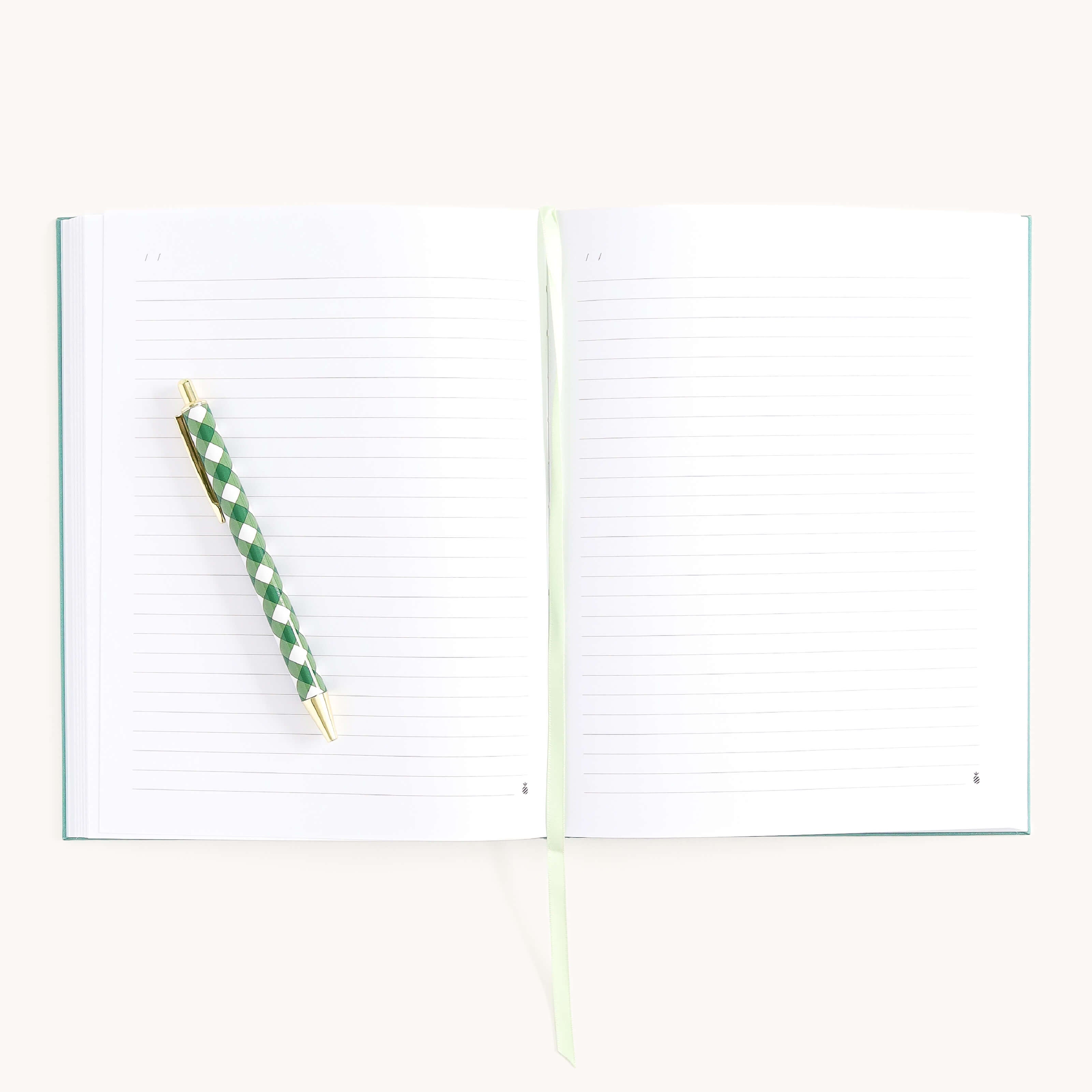 Luna Moths Linen Journal open to lined pages with ribbon bookmark and pen, perfect for journaling thoughts, notes, and daily reflections