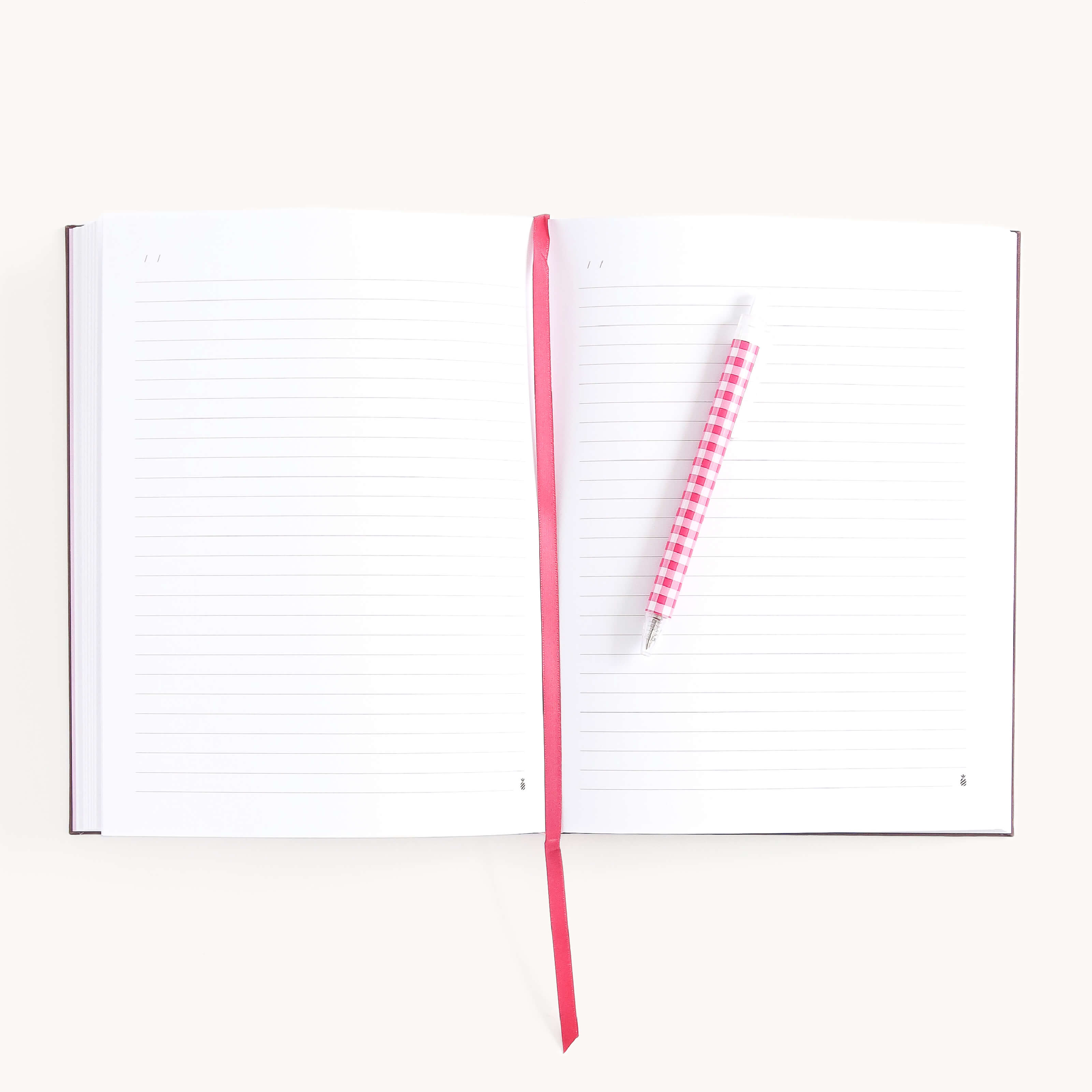 Swan Linen Journal open to lined pages with ribbon bookmark and pen, perfect for journaling thoughts, notes, and daily reflections