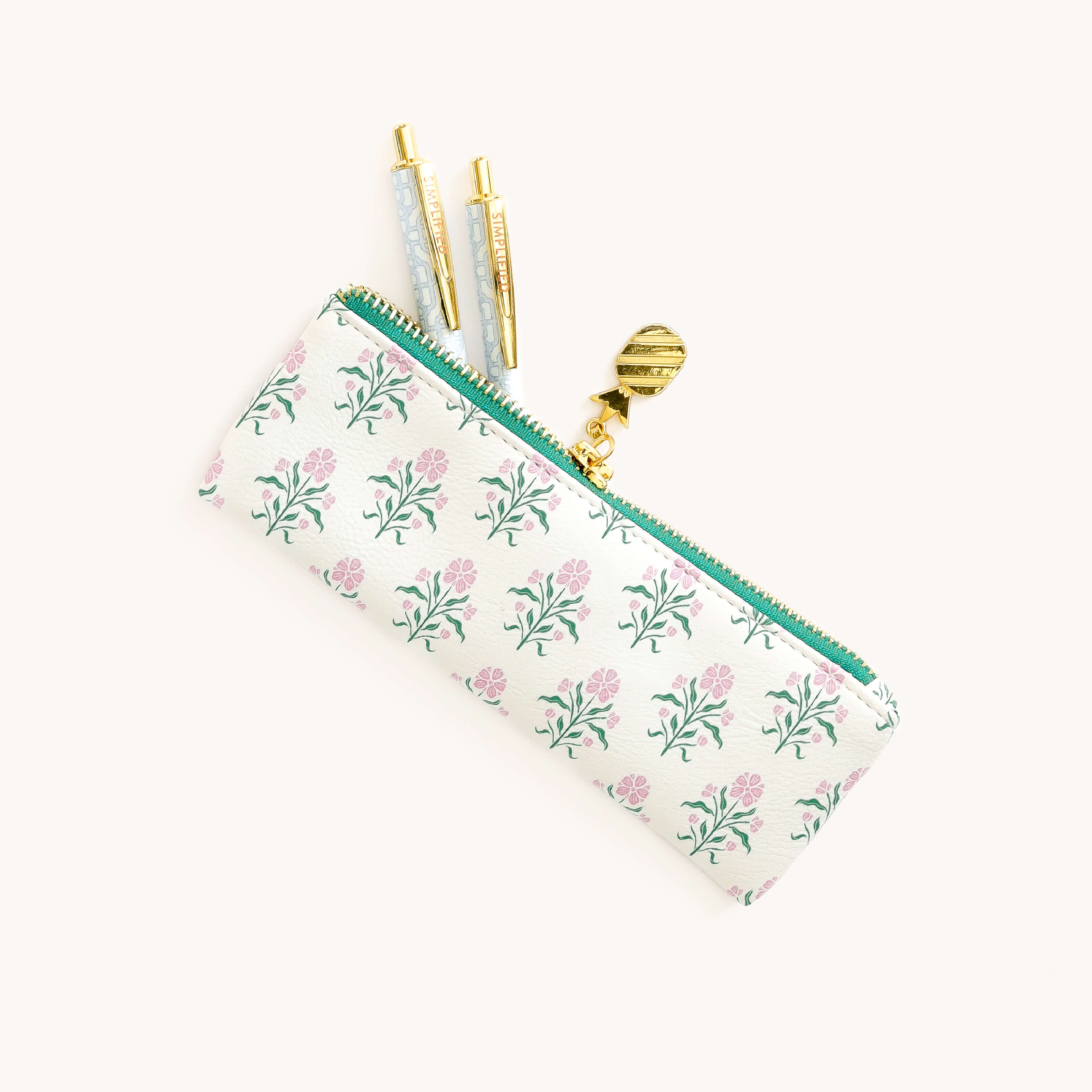 Blush Botanical Petite Pen pouch with gold zipper and pens on a white backgroun