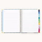The 2026 Spiral Weekly Simplified Planner - Camp Gingham by Simplified features lined pages, colorful tab dividers on the right edge, and gold-accented cover corners—perfect for organizing your year ahead.