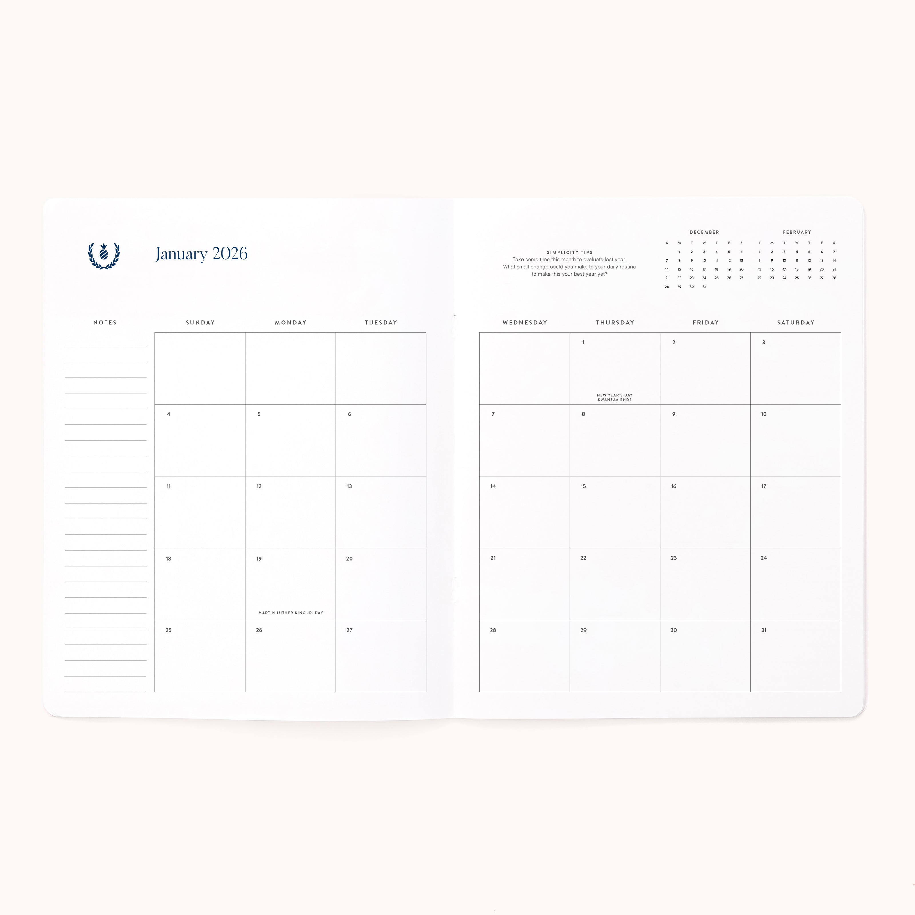 The 2026 Softcover Monthly Simplified Planner - Happy Stripe by Simplified features an open spread with a January 2026 calendar, space for notes on the left, and small overview calendars for December 2025 and February 2026 in the top right.