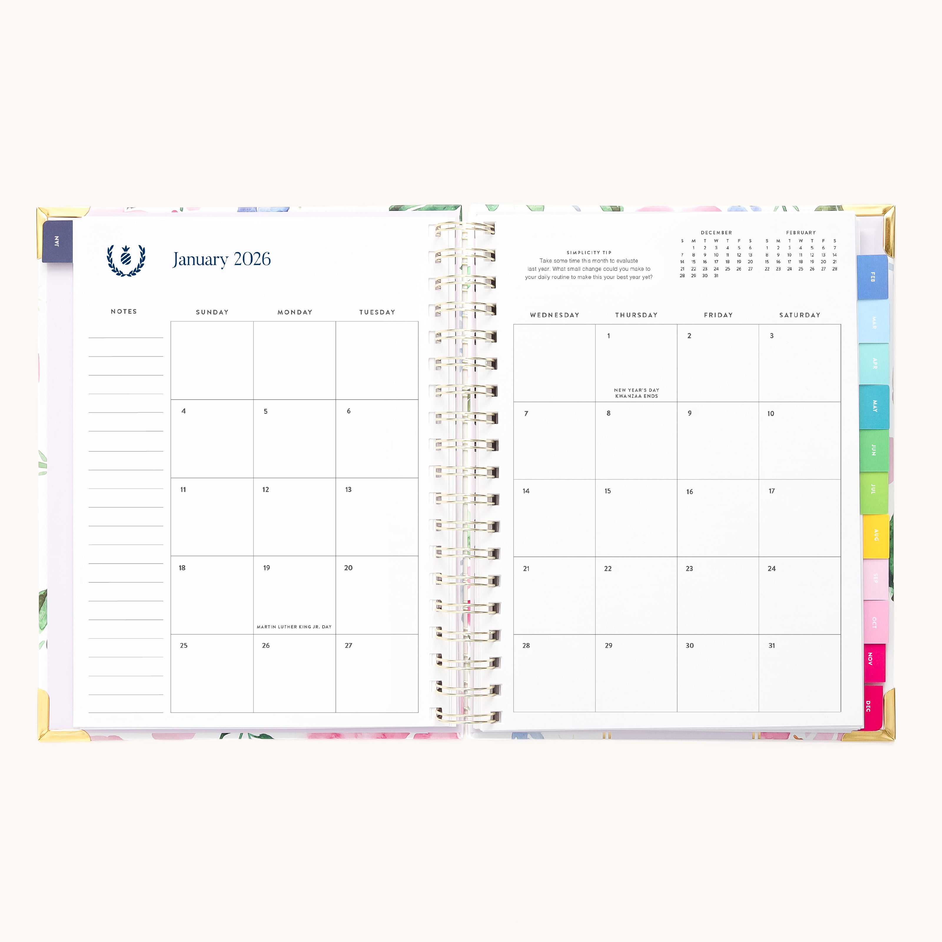 The Simplified 2026 Spiral Weekly Simplified Planner - Cottage Floral is open to January’s monthly calendar, showing tabbed section dividers on the right and a notes column on the left, with a subtle floral-patterned background.