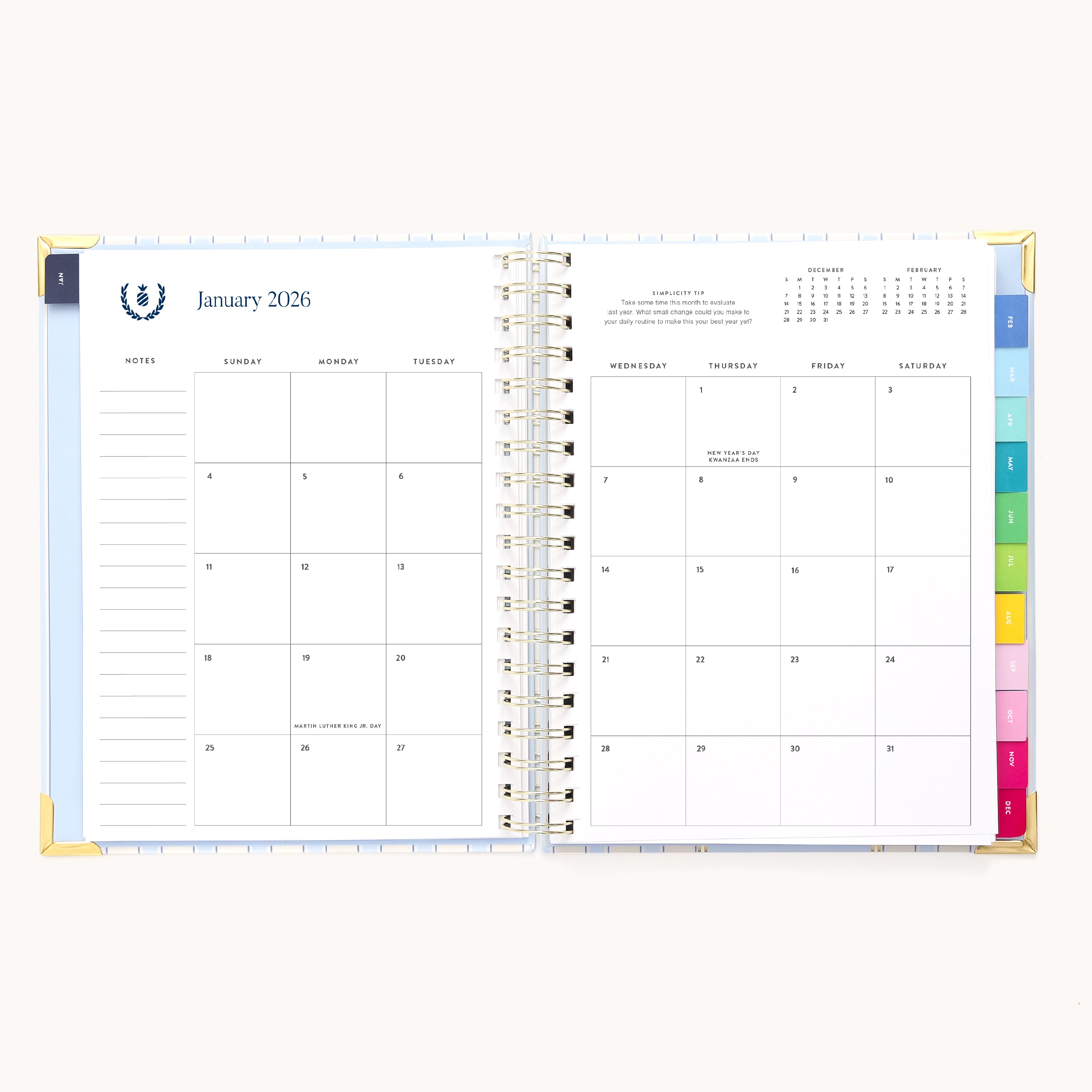 The Simplified 2026 Spiral Weekly Simplified Planner in Serene Stripe shows the January 2026 calendar with color-coded tabs, a notes section, and a grid layout—ideal for organized planning all year.