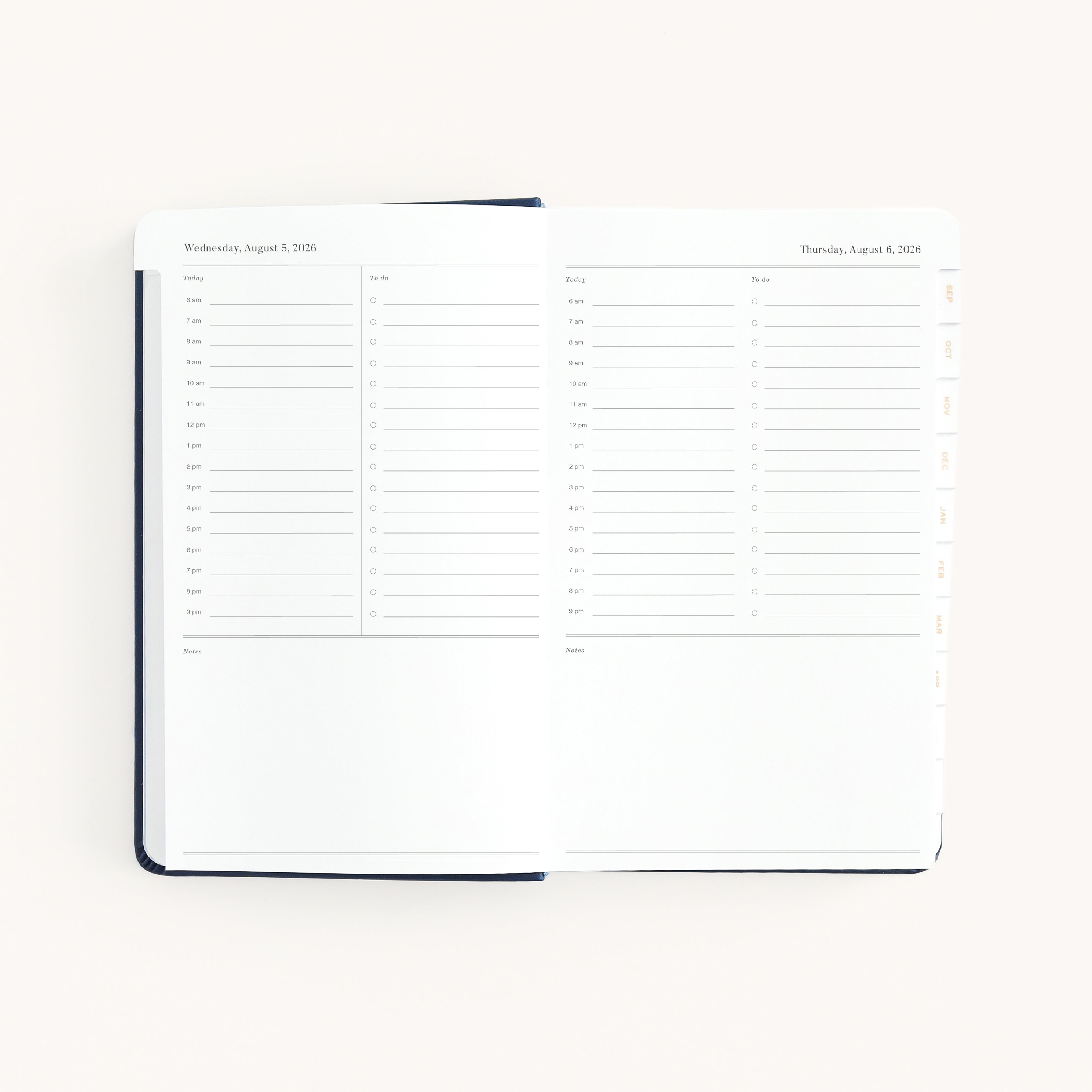 Daily dapperdesk planner open to Wednesday and Thursday pages with structured hourly layout for focused productivity