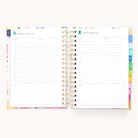 The Simplified 2026 Spiral Daily Simplified Planner - Cottage Floral features dated pages with schedules from 6 a.m. to 7 p.m., lined notes, and colorful monthly tab dividers—ideal for staying organized all year.