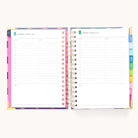 The 2026 Spiral Daily Simplified Planner - Rainbow Row by Simplified features daily pages with 6 a.m. to 7 p.m. time slots, notes sections, and vibrant tabbed dividers along the right edge in this colorful spiral planner.