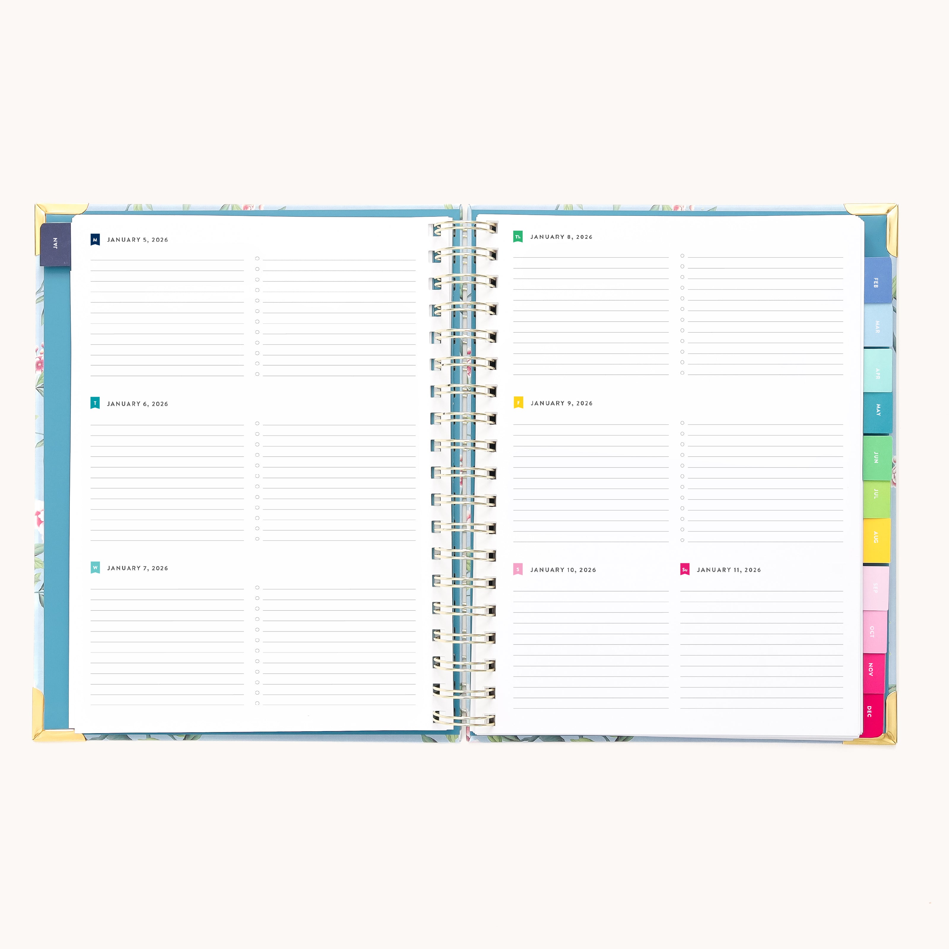 The Simplified 2026 Spiral Weekly Simplified Planner – Faraway Land shows two pages with lined daily sections dated for January, plus colorful tab dividers along the right edge.