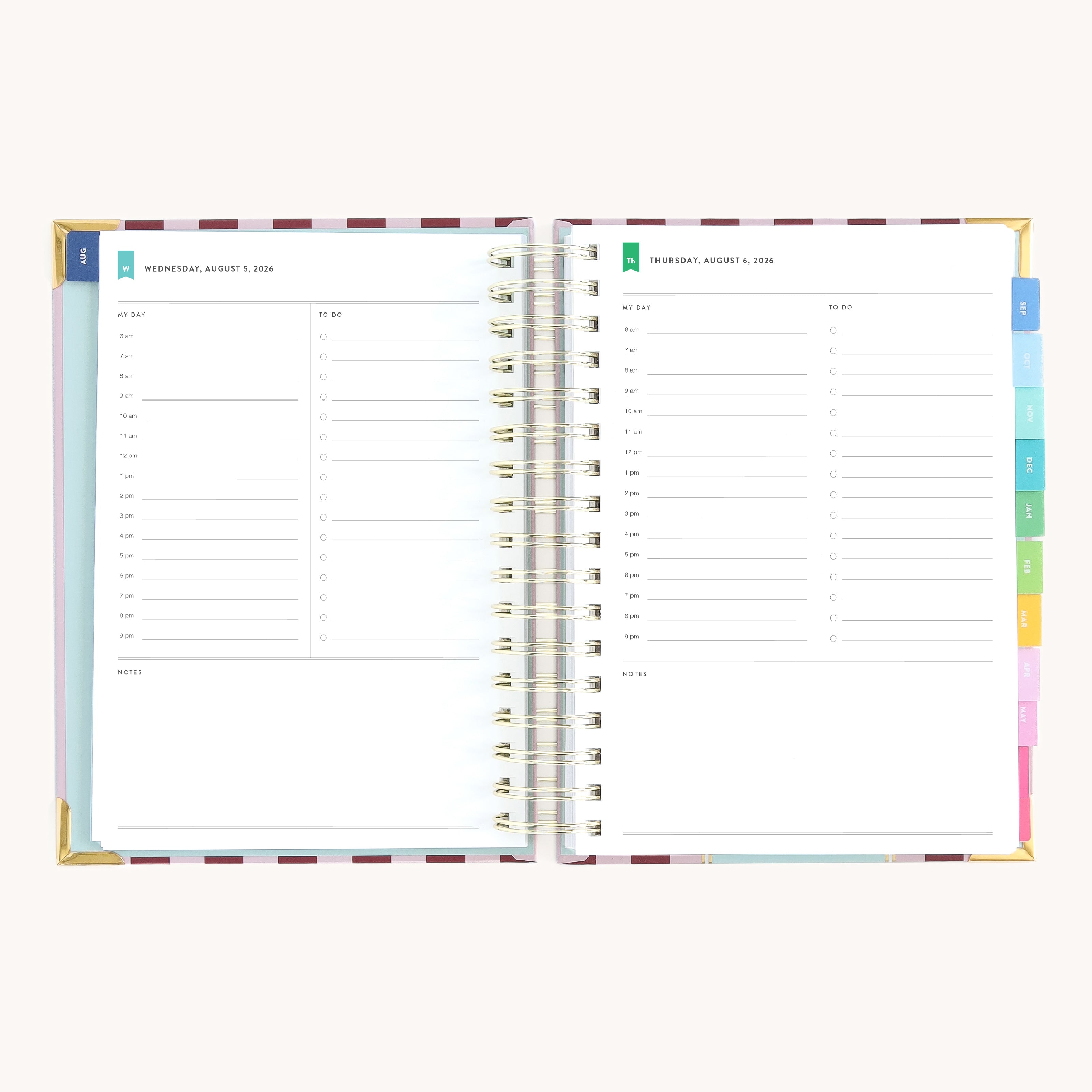 Spiral daily planner open to Wednesday and Thursday pages with structured hourly layout for focused productivity