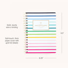 The 2026 Softcover Weekly Simplified Planner - Happy Stripe by Simplified features colorful stripes, gold wire-o binding, a thick soft-touch cover with gold foil details, and measures 8.5 x 6.25.
