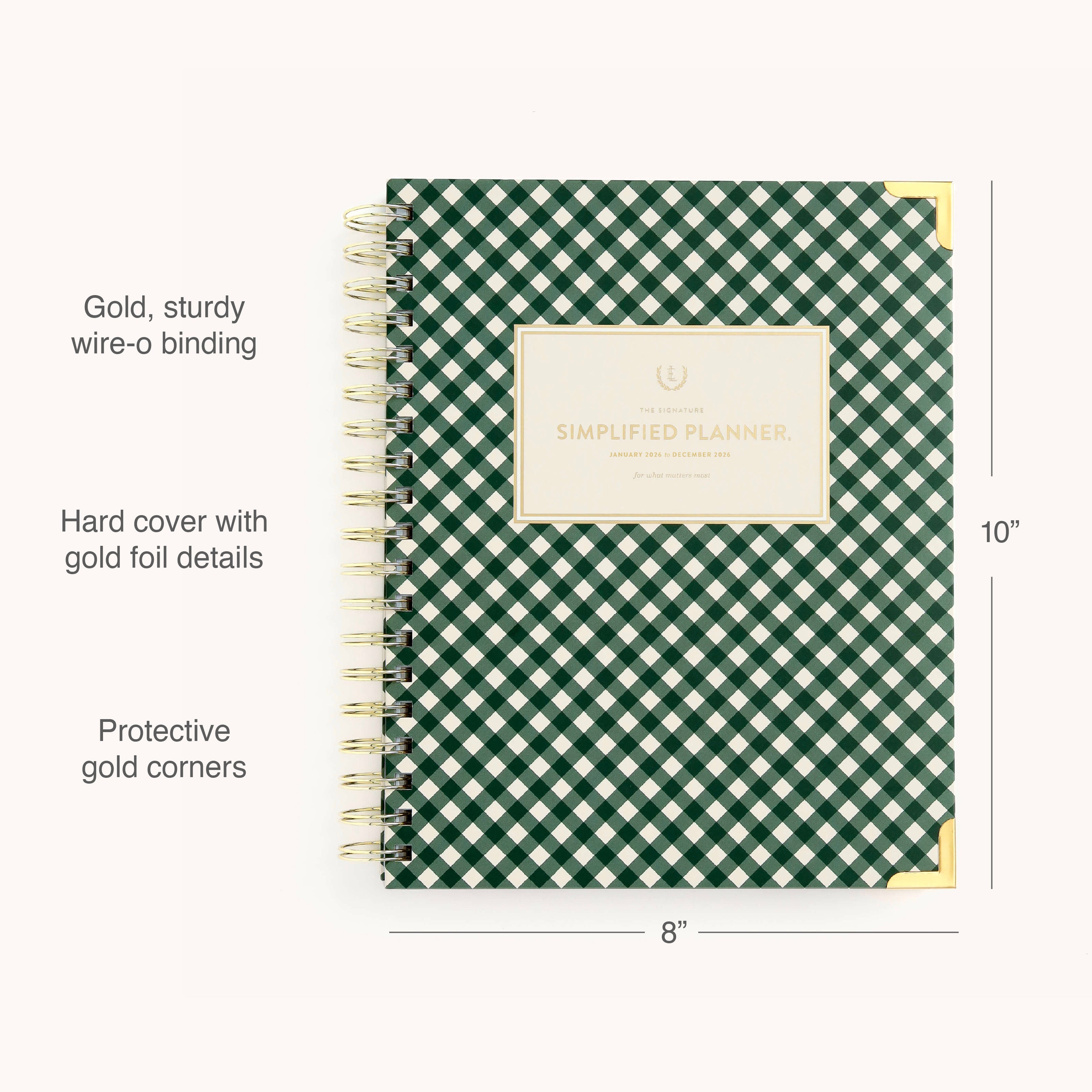 The Simplified 2026 Spiral Weekly Simplified Planner - Camp Gingham features a green and white checkered cover, gold wire-o binding, gold foil details, protective gold corners, and measures 10x8. Text labels note these features.