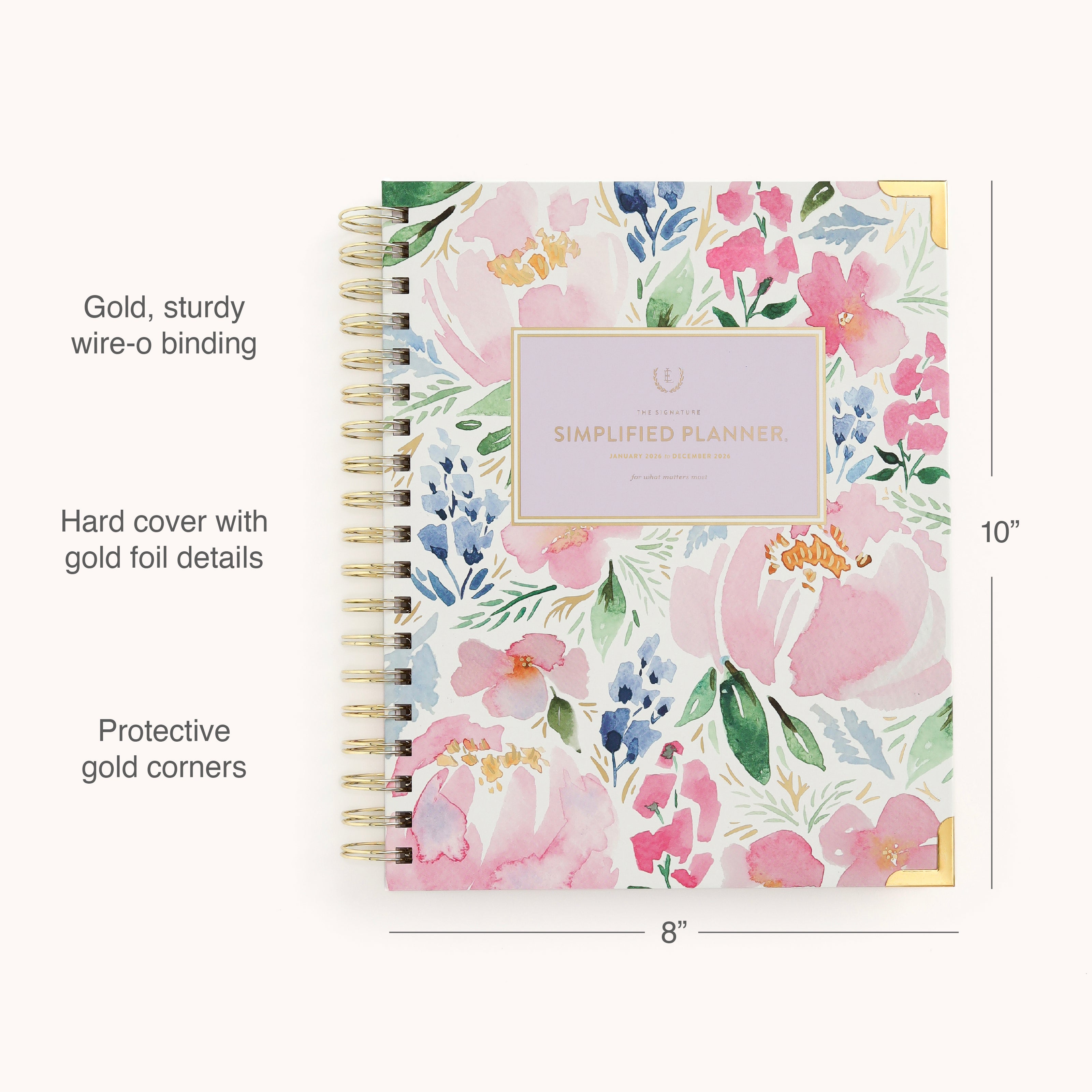 The 2026 Spiral Weekly Simplified Planner - Cottage Floral by Simplified features a floral hardcover, gold wire-o binding, gold foil details, and protective corners. Size: 10x8. The cover reads “Simplified Planner.” Perfect for organizing 2026!.